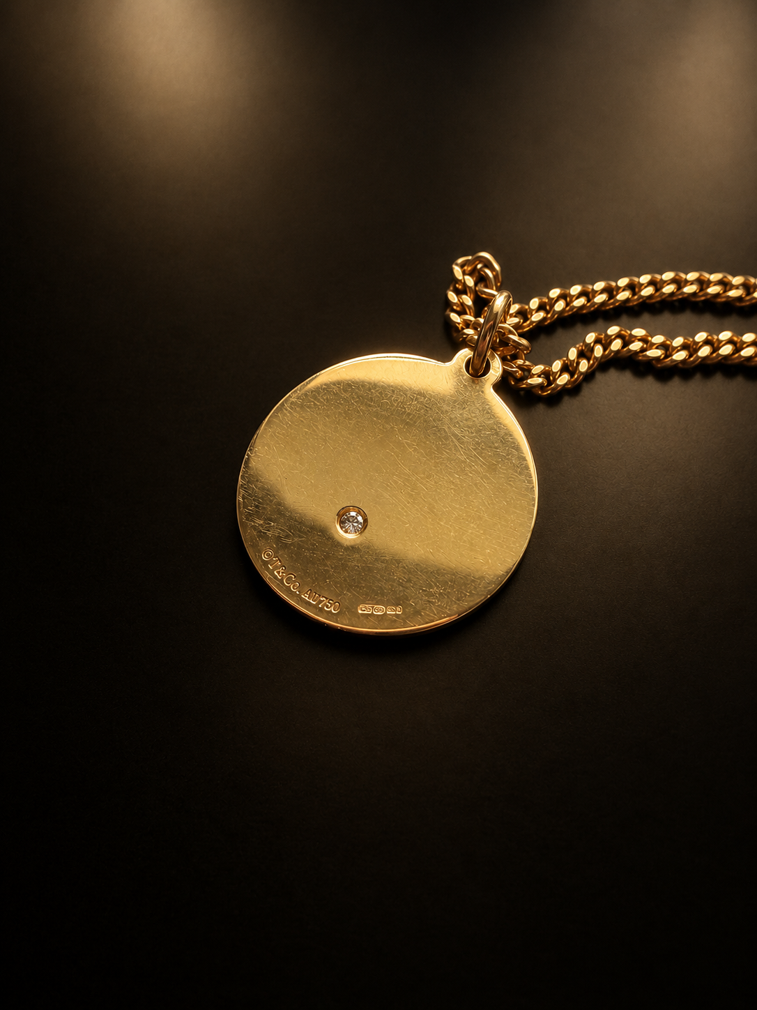 Vintage Tiffany & Co. “Good Fortune” 18K Gold diamond Charm Pendant