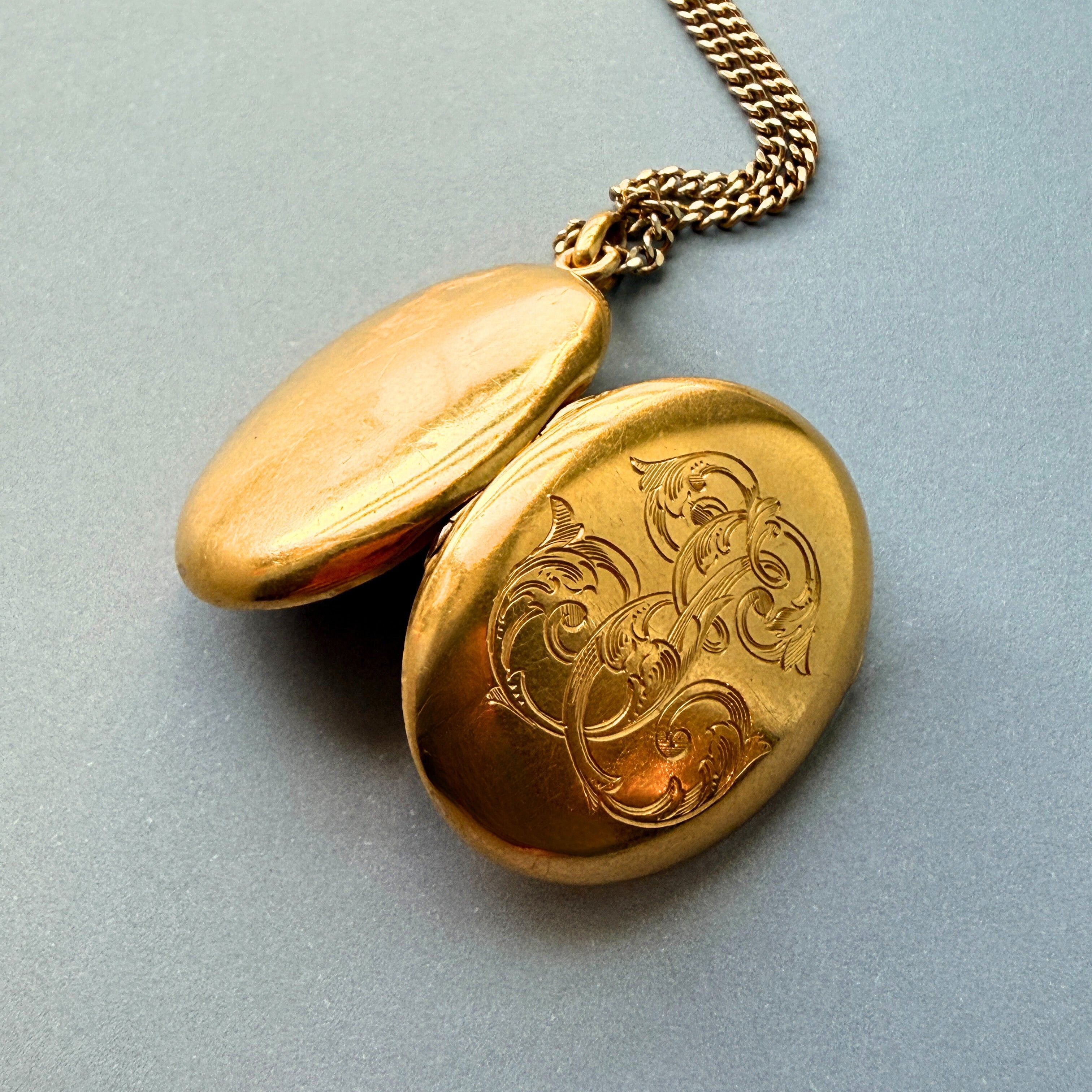 Art Nouveau era 18K Gold “E” and “J” Locket Pendant