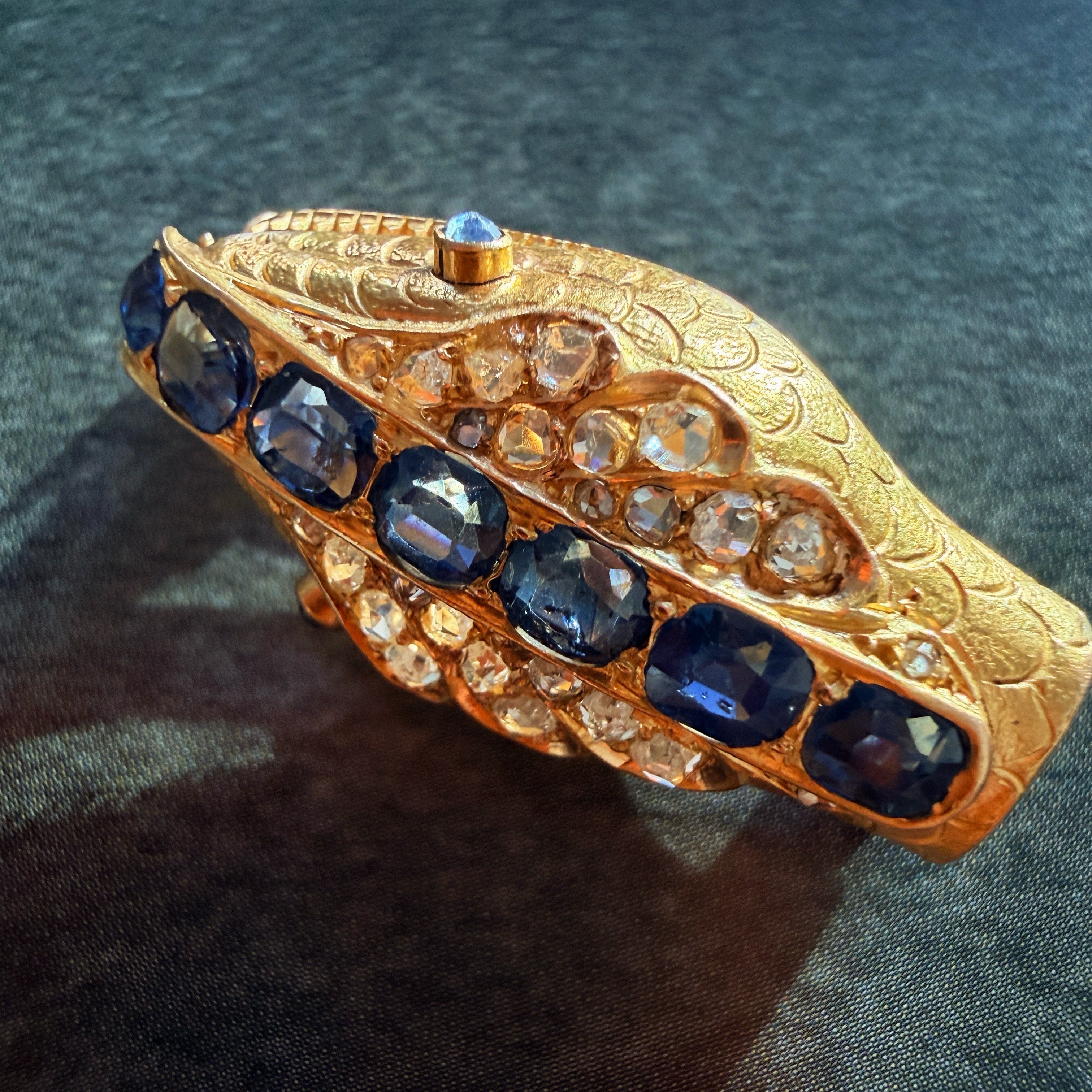 Antique 18K gold blue sapphire diamond snake head brooch