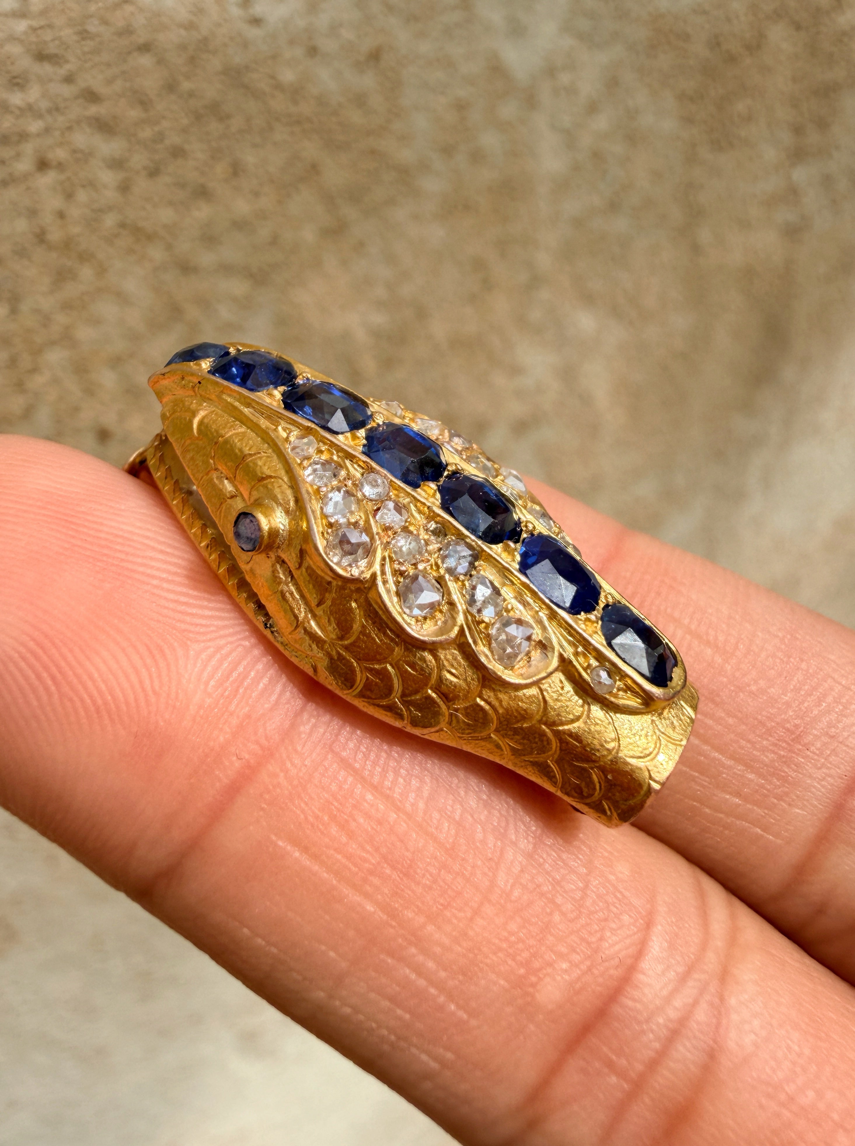 Antique 18K gold blue sapphire diamond snake head brooch