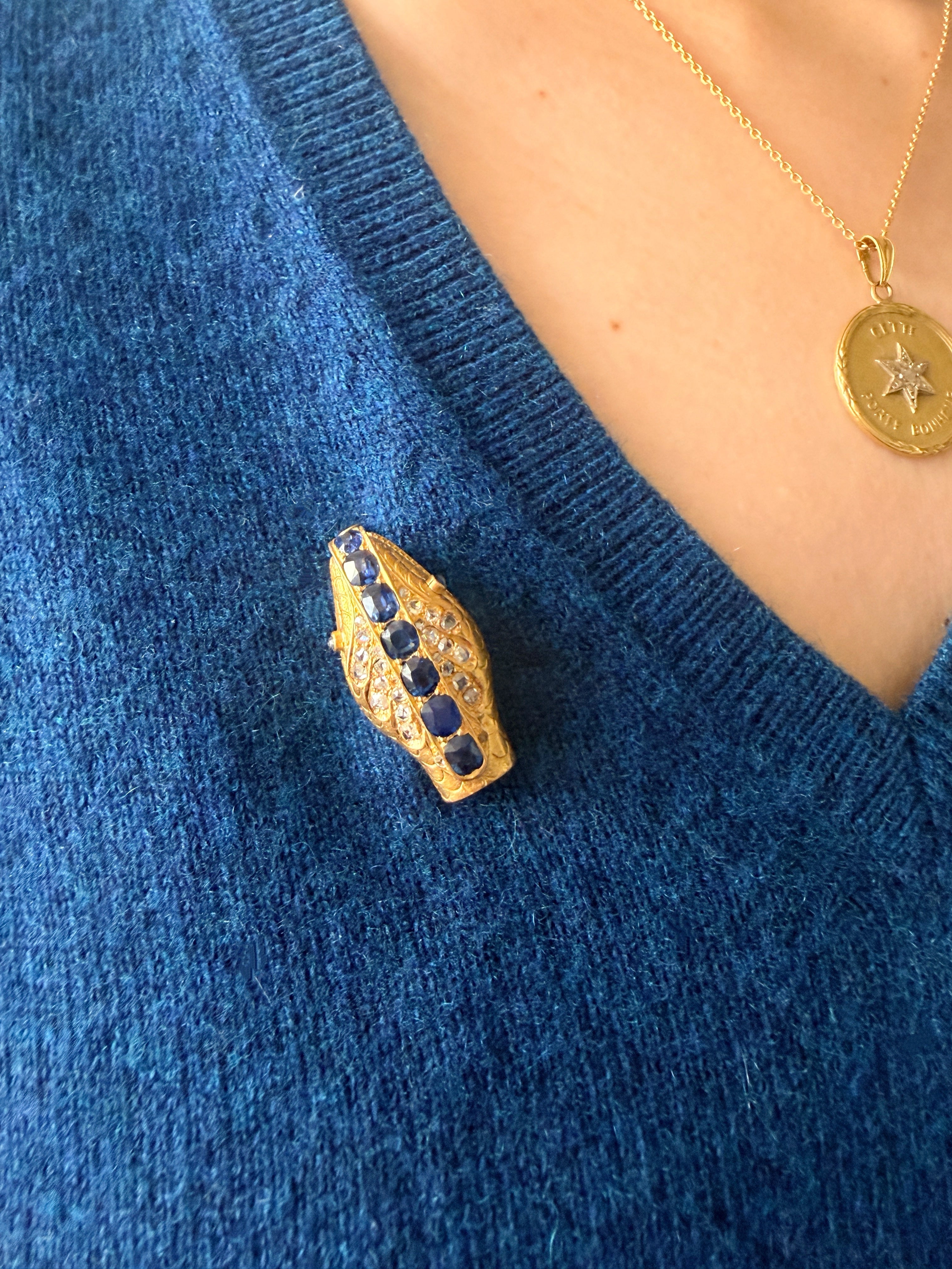 Antique 18K gold blue sapphire diamond snake head brooch