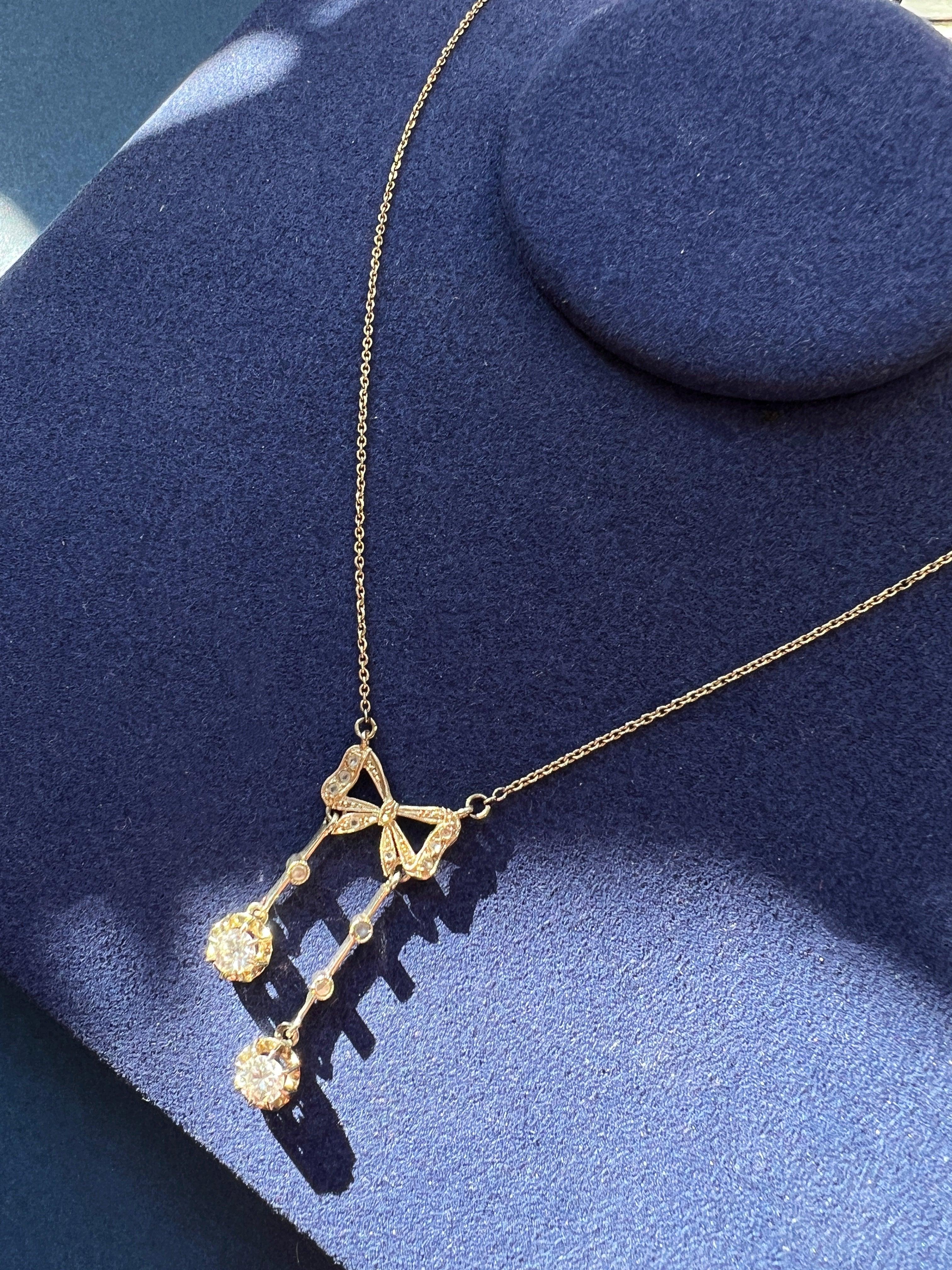 Antique French 18K white gold diamond bow negligée necklace