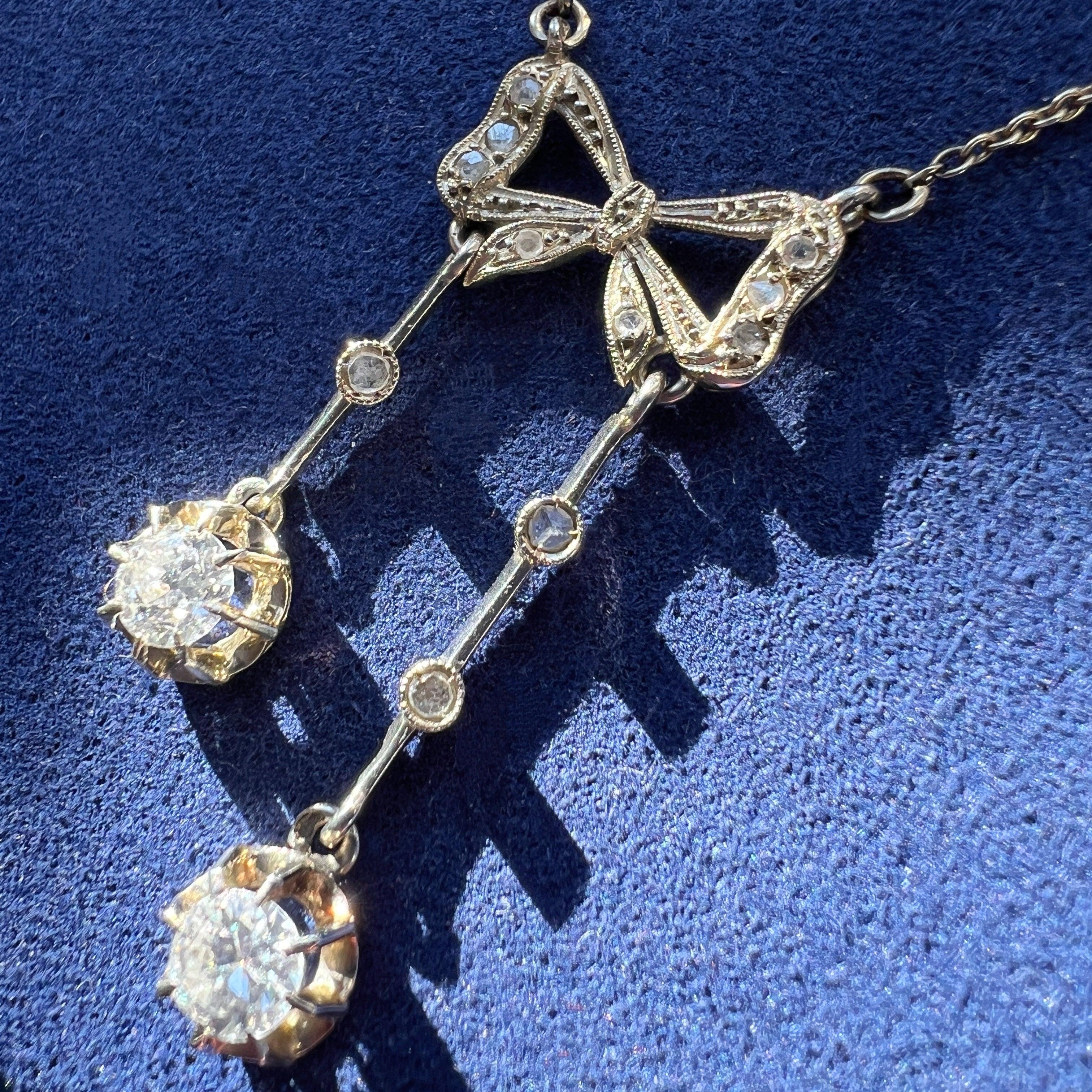 Antique French 18K white gold diamond bow negligée necklace