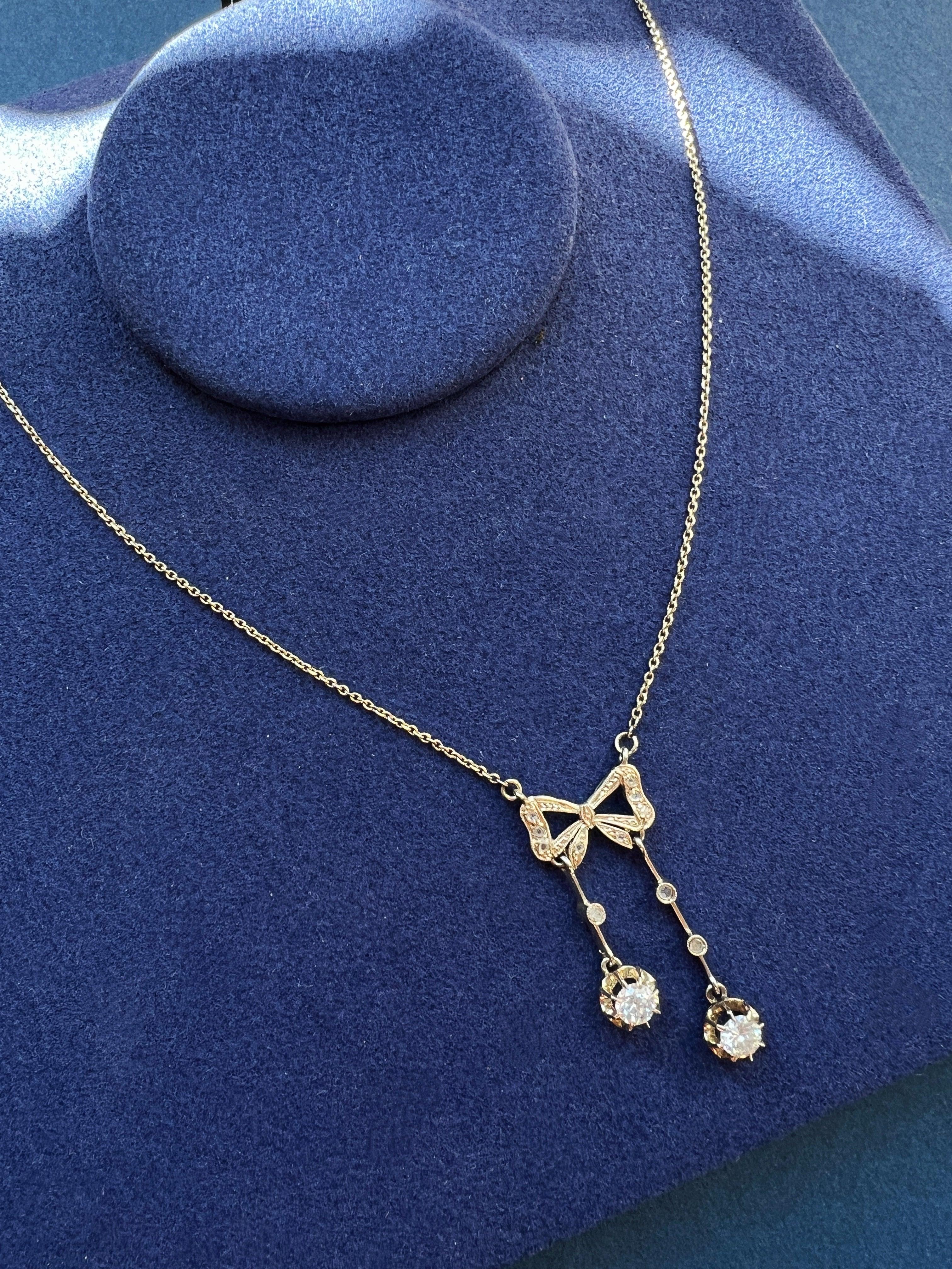 Antique French 18K white gold diamond bow negligée necklace