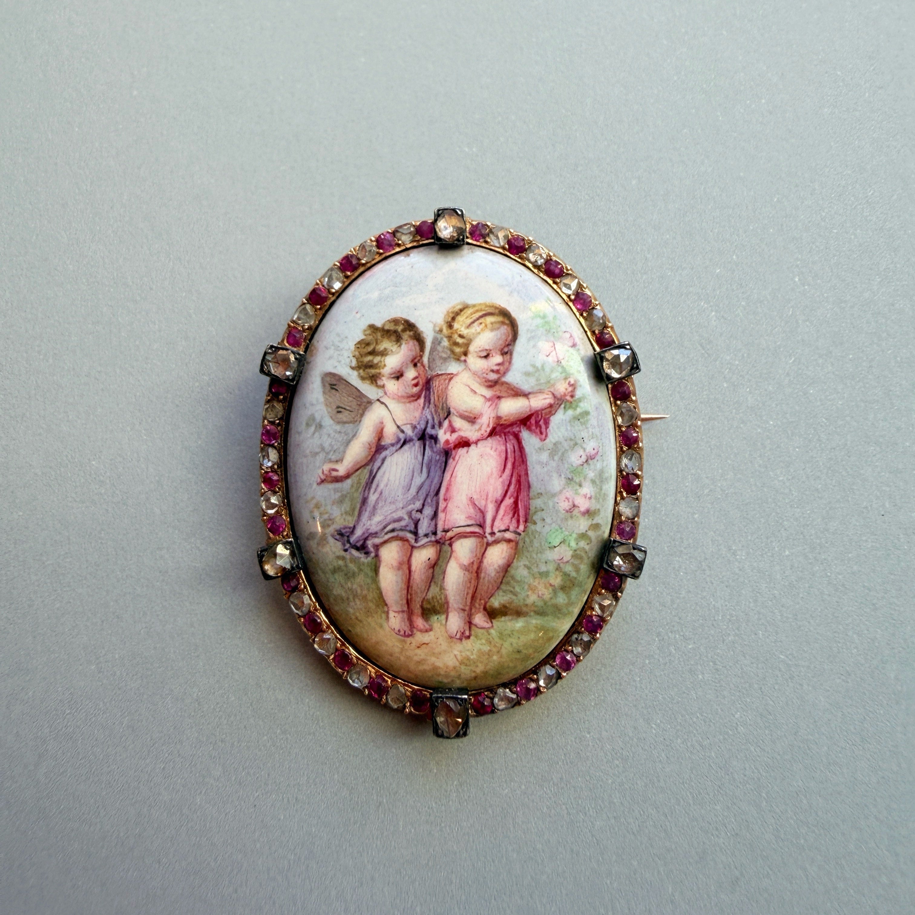 Victorian era 18K gold ruby diamond cherub miniature brooch