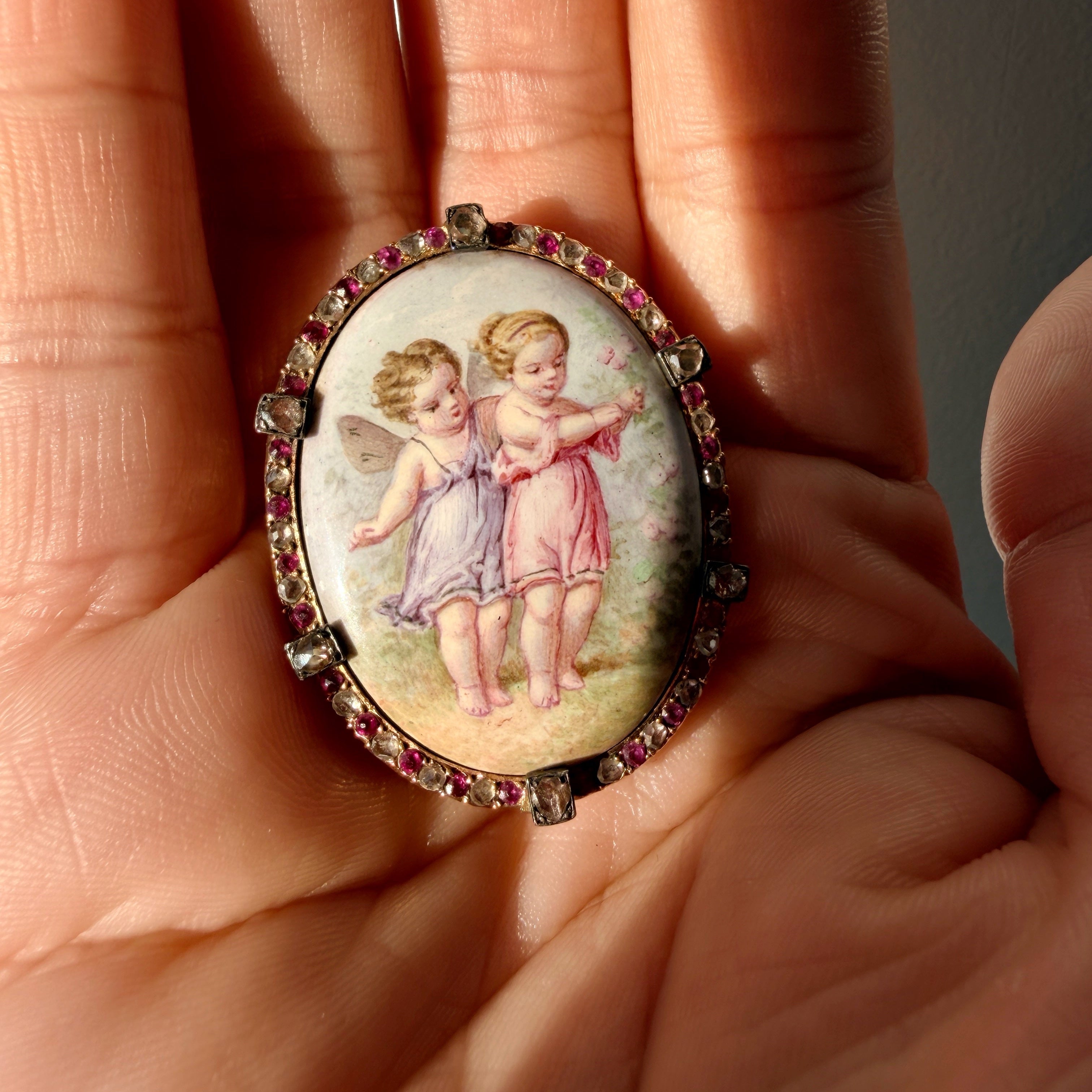 Victorian era 18K gold ruby diamond cherub miniature brooch