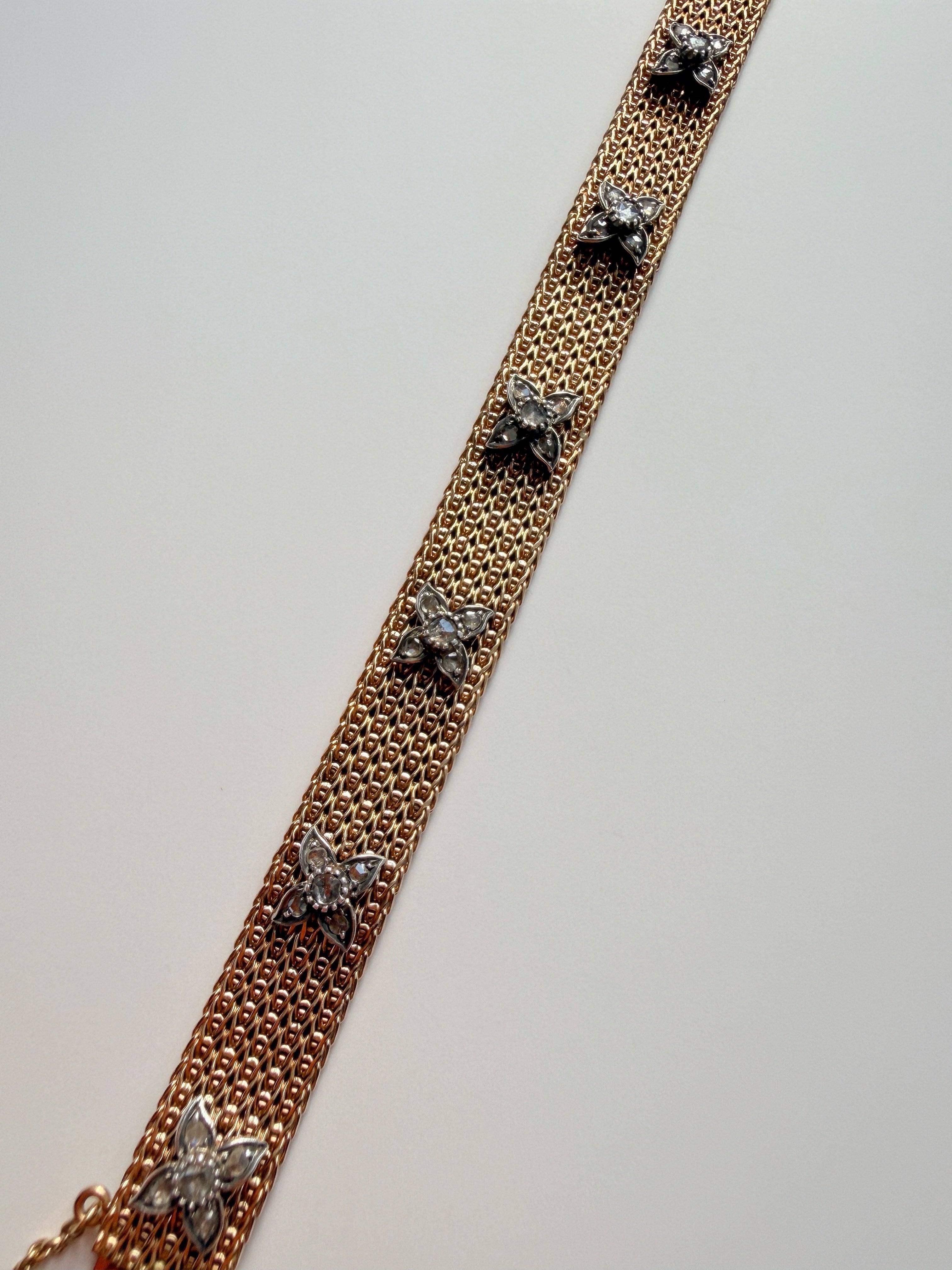 Vintage 18K yellow gold woven gold bracelet with diamond flowers