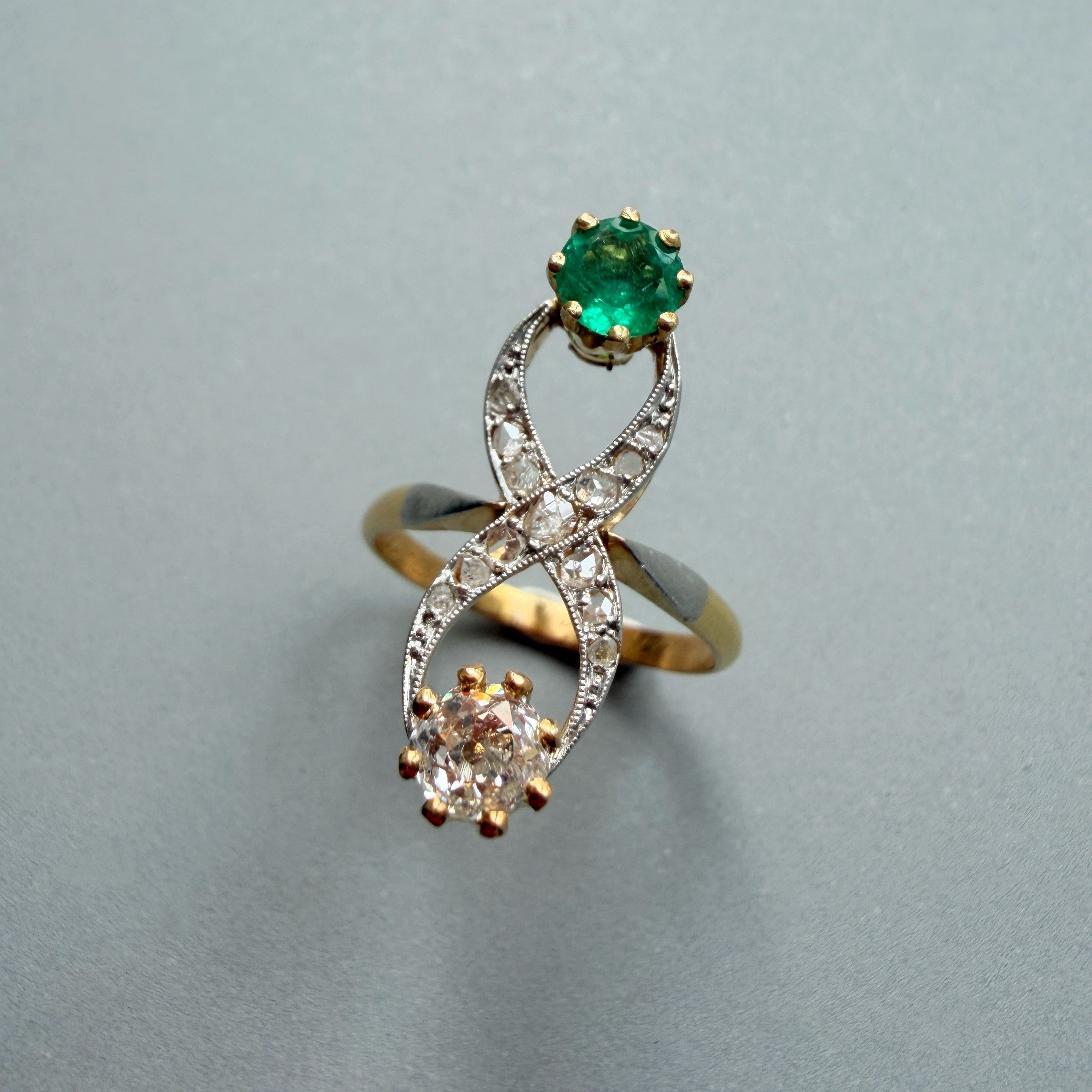 Antique 18K gold emerald diamond princess ring