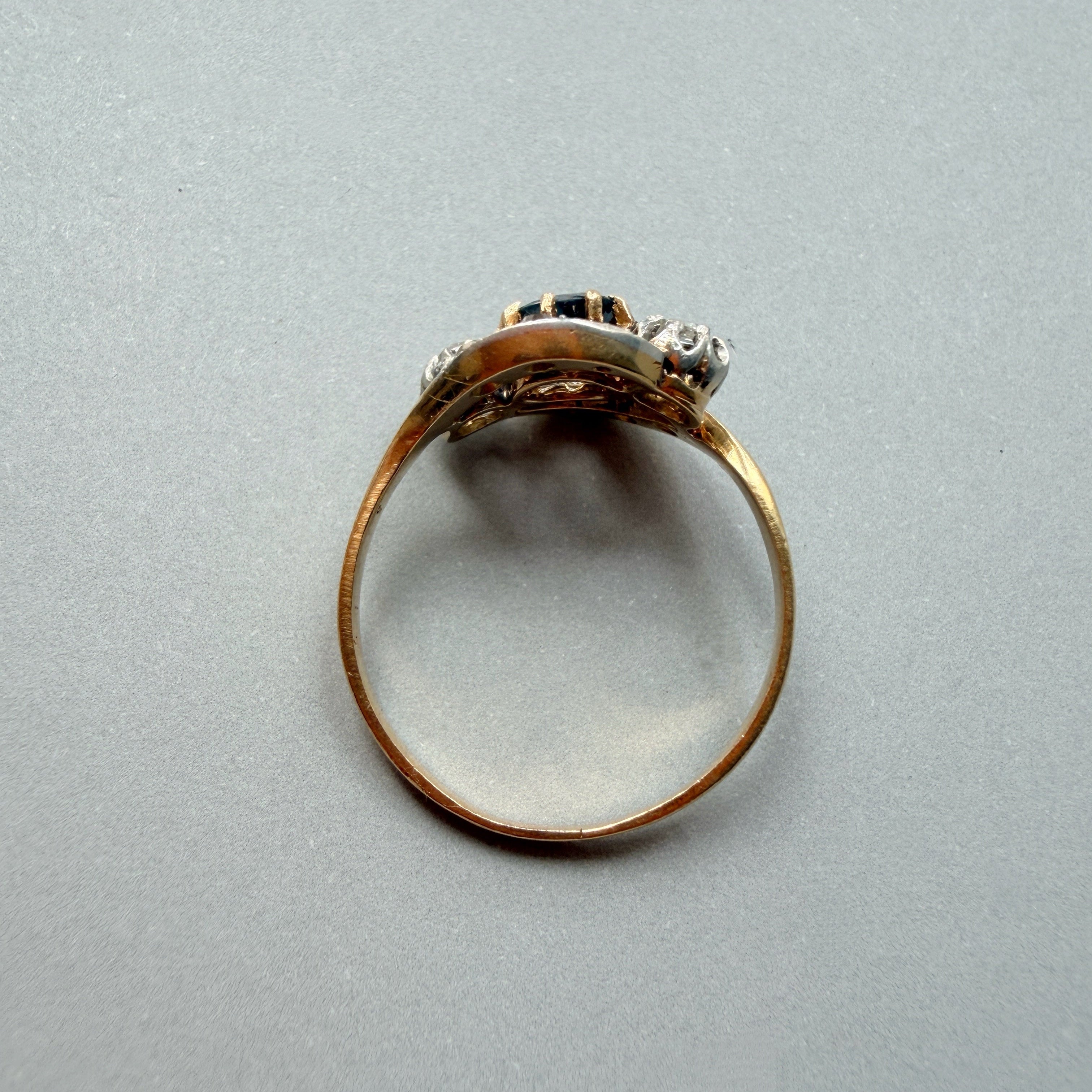 Antique 18K gold blue sapphire diamond tourbillon ring