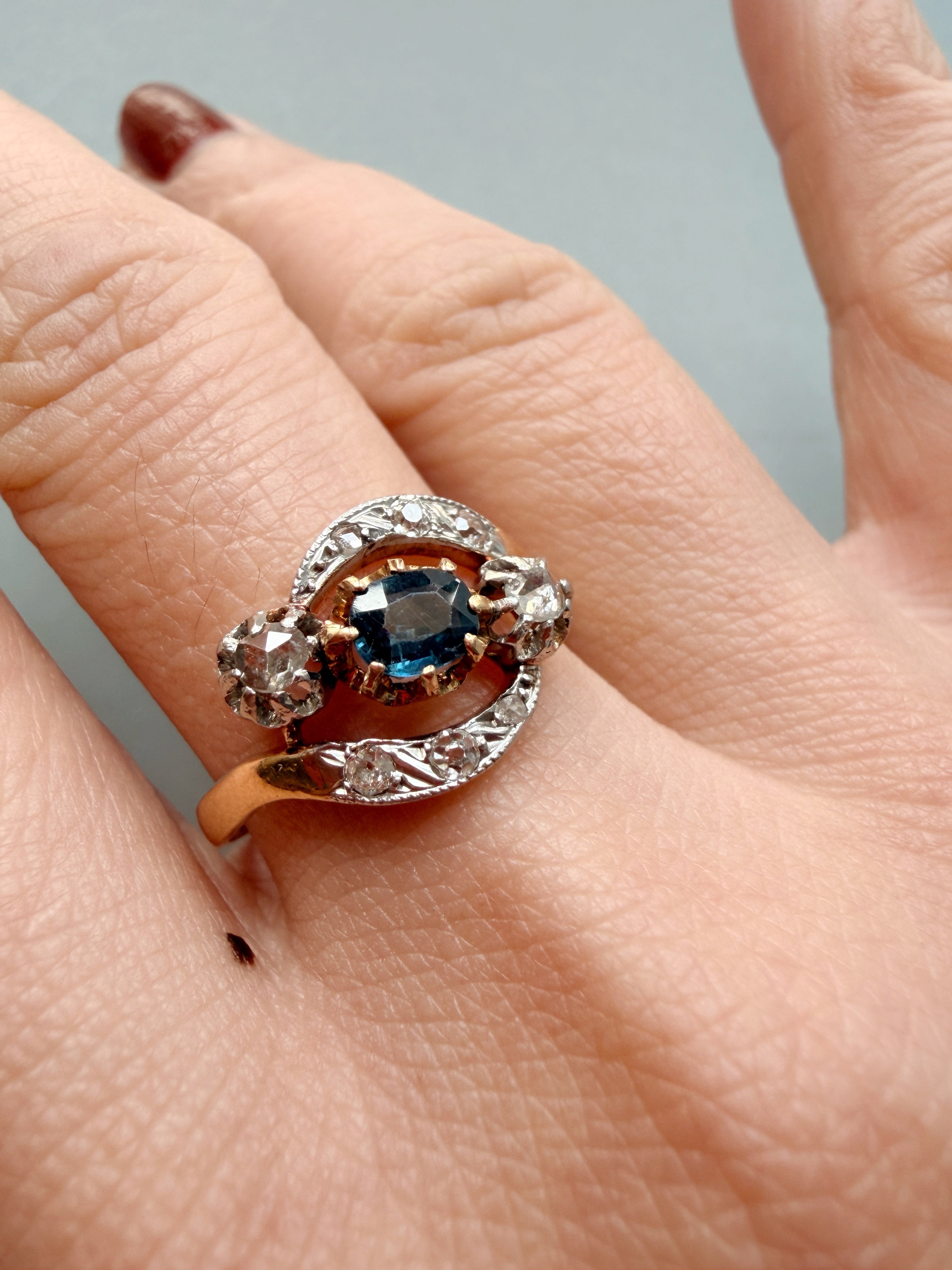 Antique 18K gold blue sapphire diamond tourbillon ring