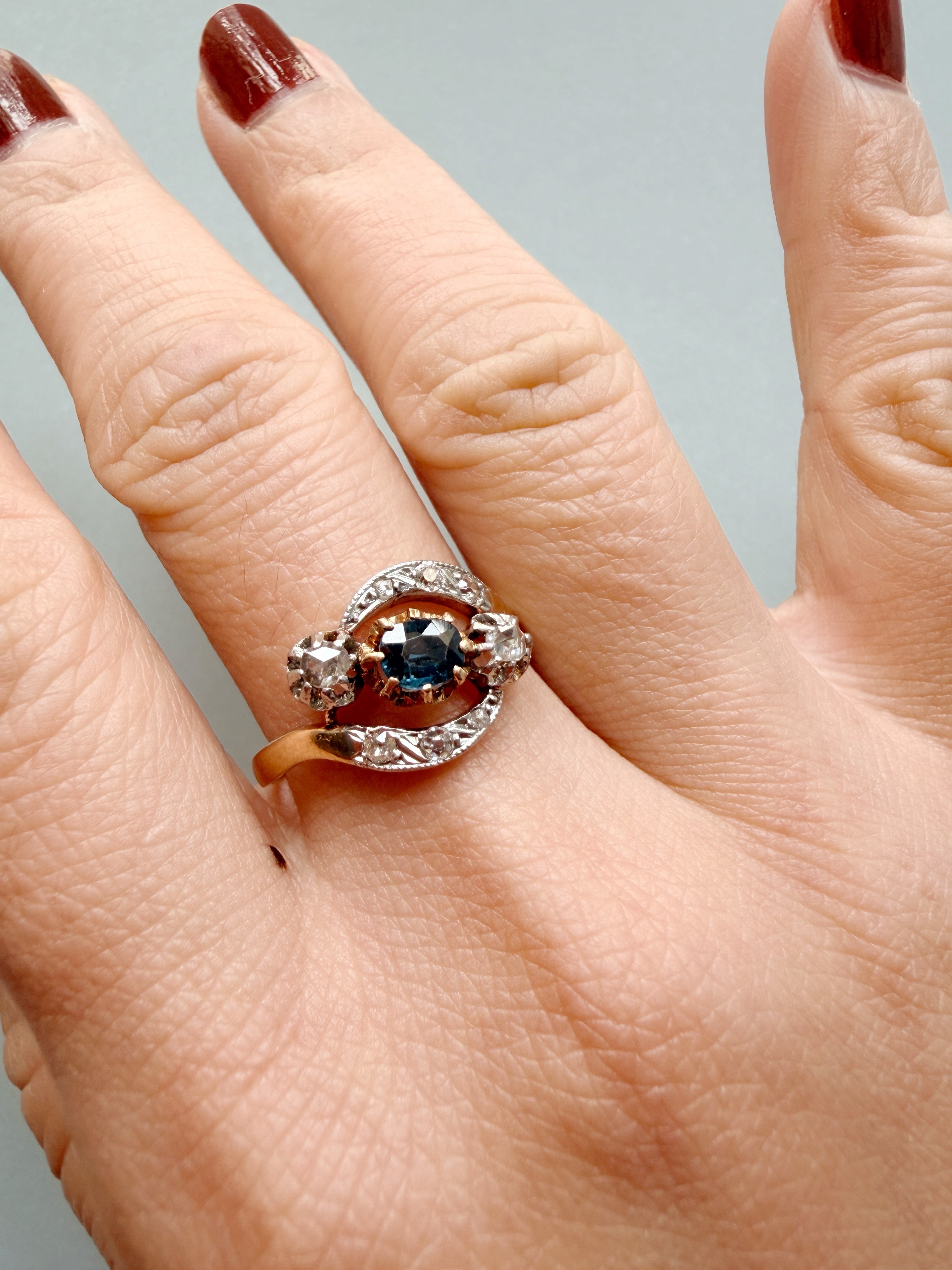 Antique 18K gold blue sapphire diamond tourbillon ring