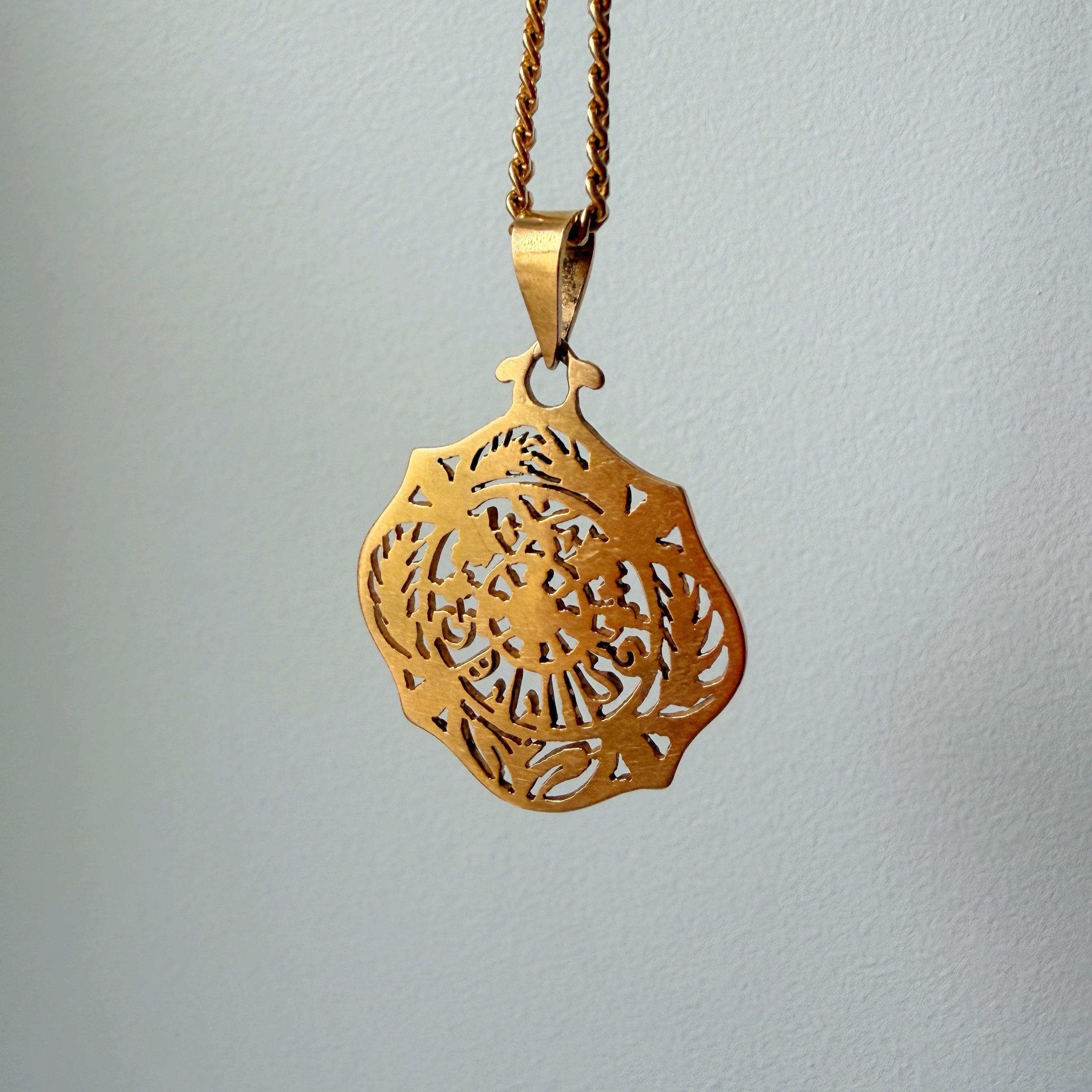 Art Nouveau era 18K gold “July” medal pendant