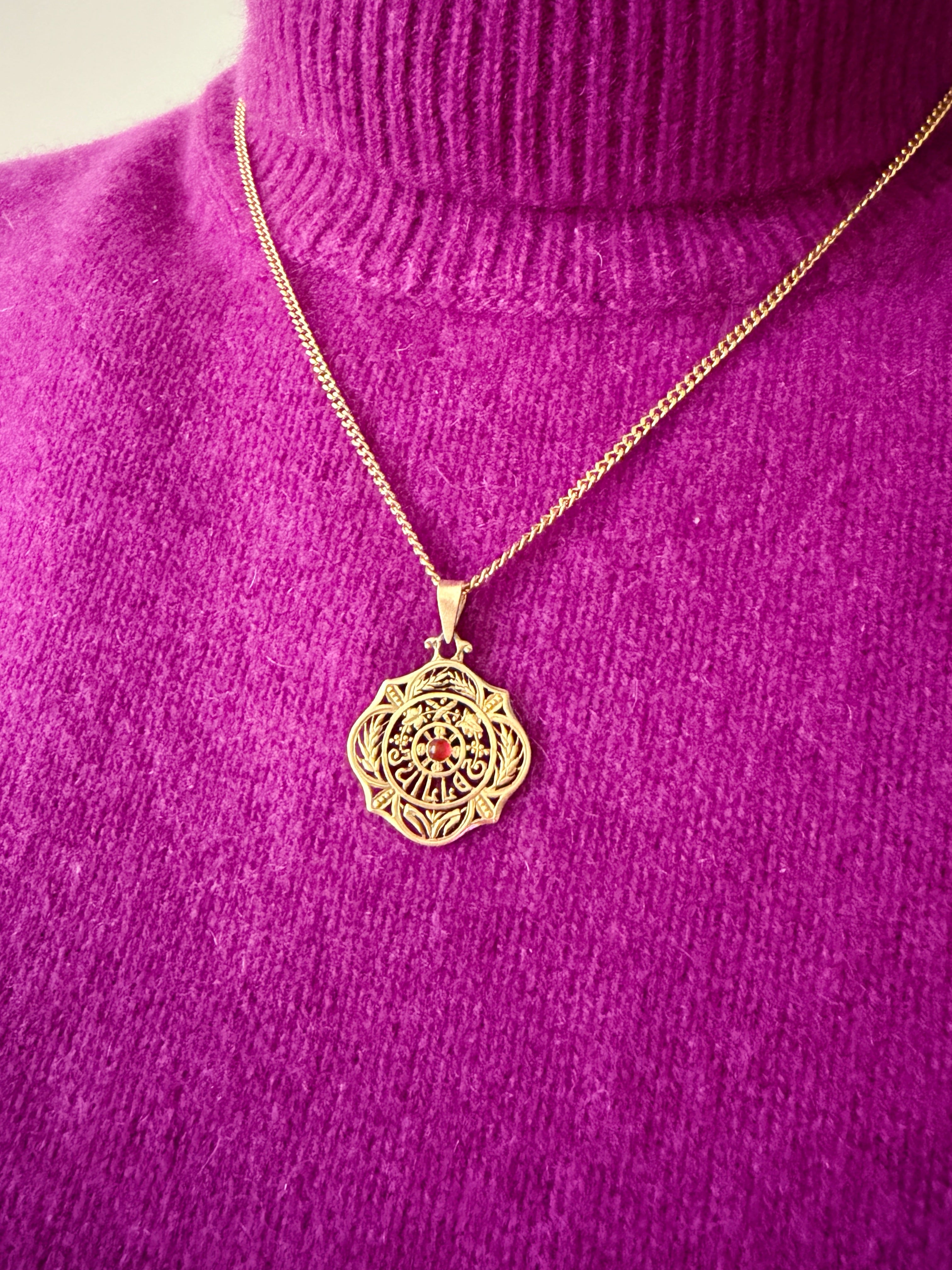 Art Nouveau era 18K gold “July” medal pendant