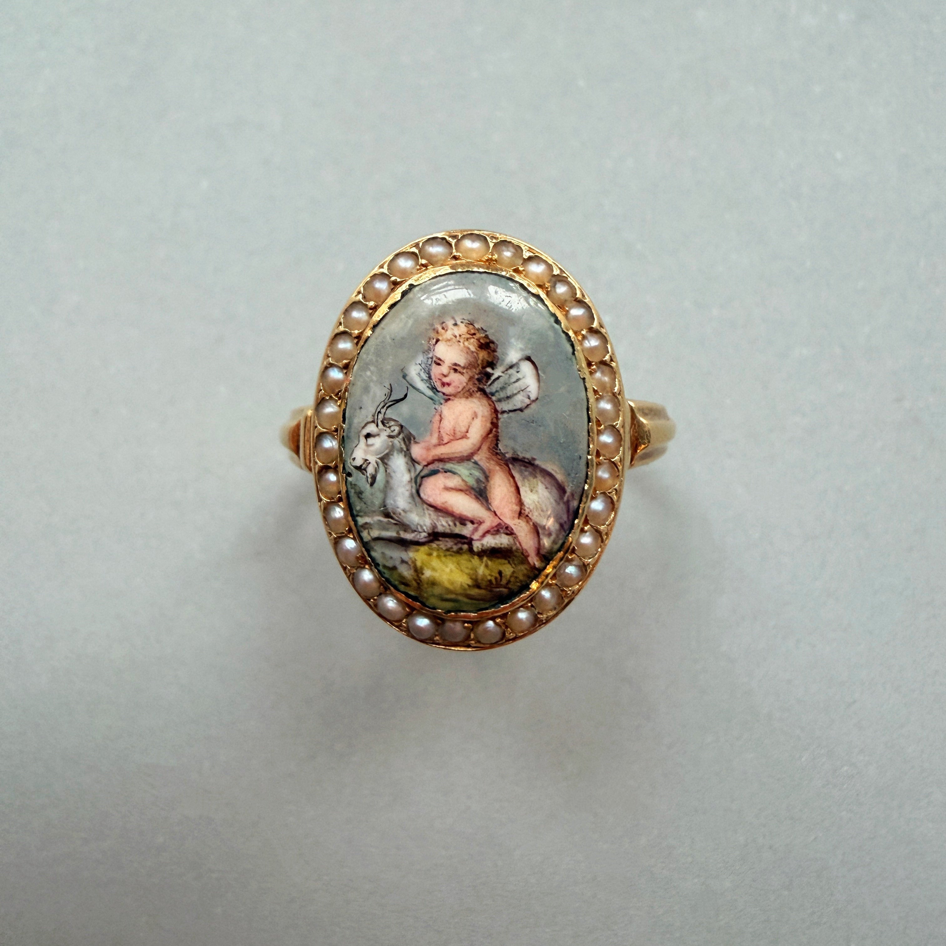 Victorian era 18K gold cherub riding a goat pearl ring