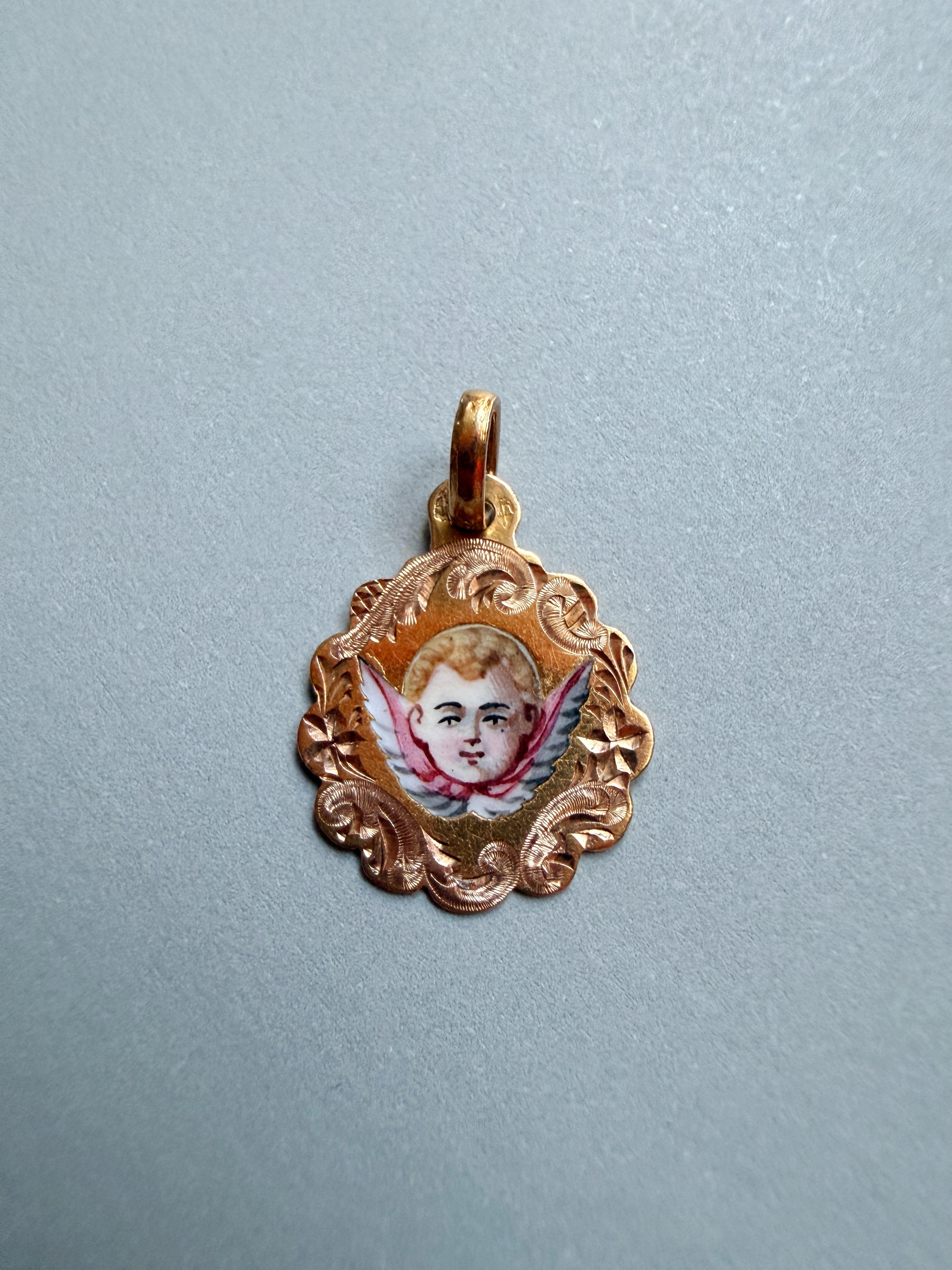 Victorian era 18K gold enameled angel cherub medal pendant