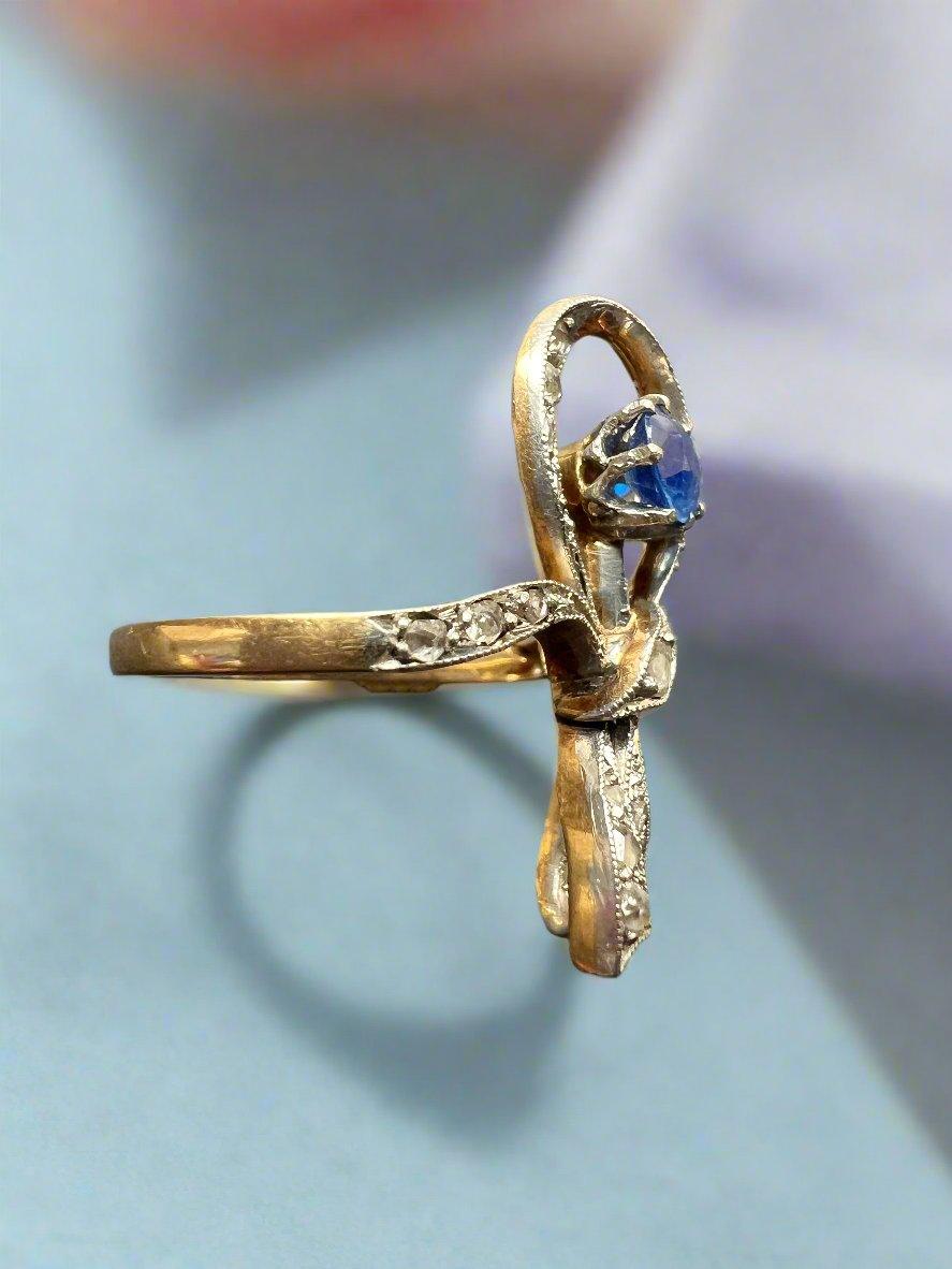 18K gold blue sapphire diamond bow ring