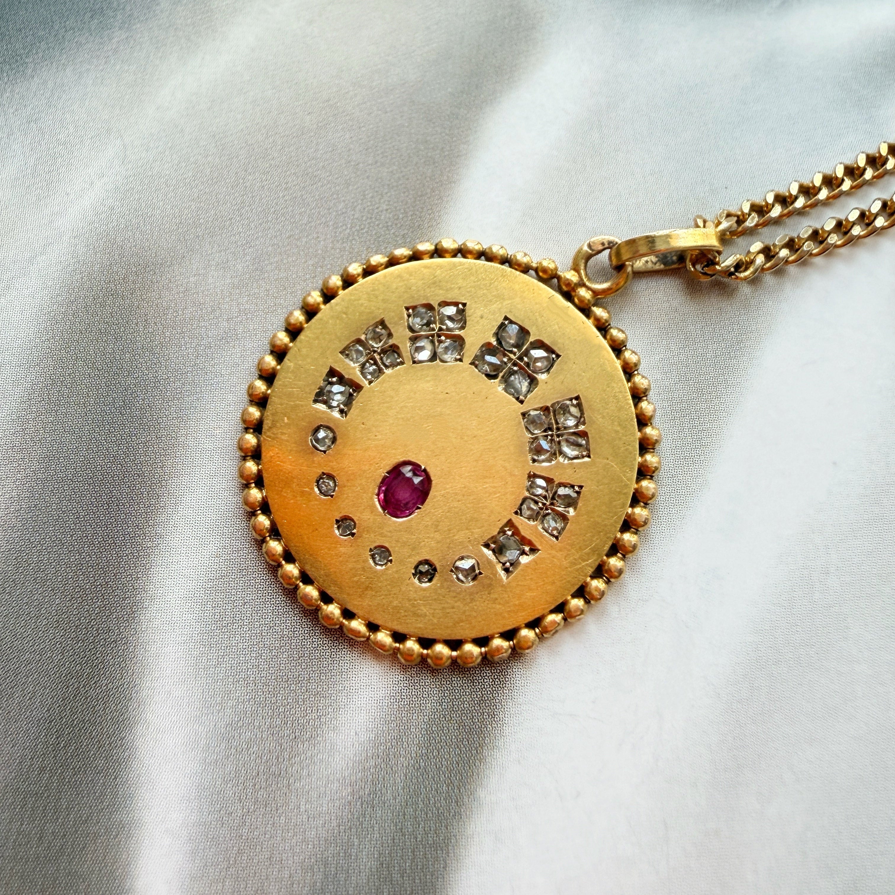 Antique 18K gold diamond ruby pendant