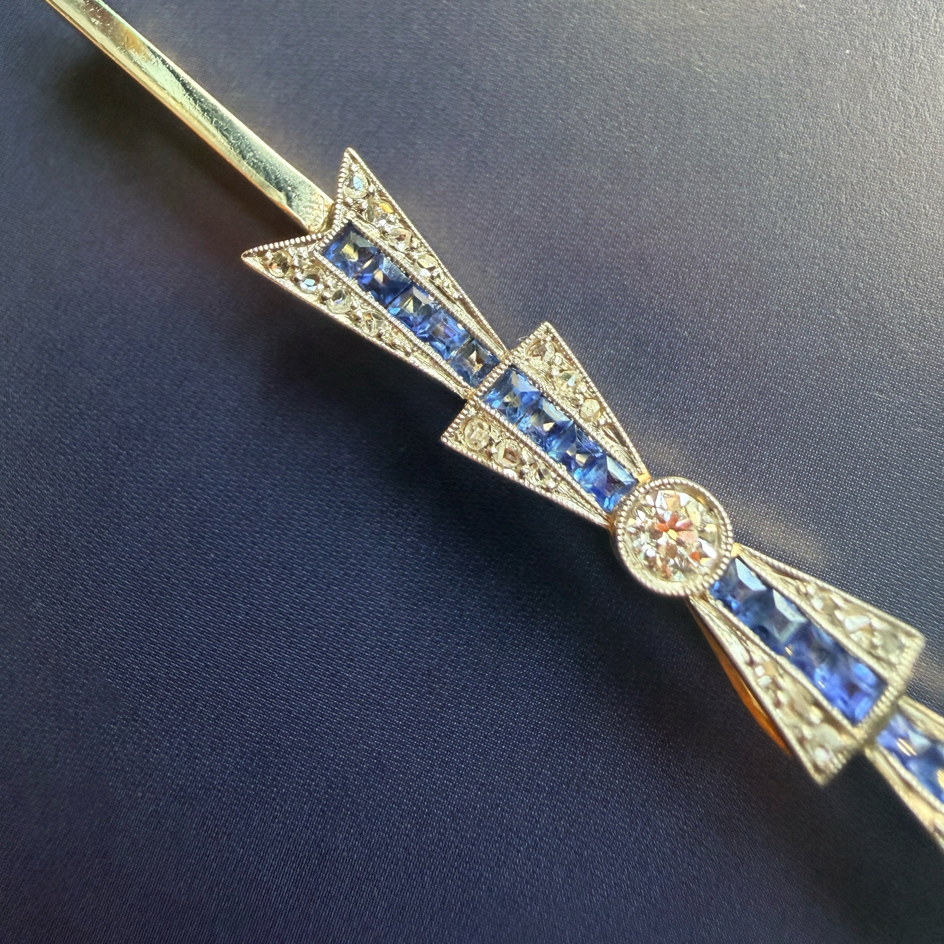 Art Deco 18K gold diamond sapphire bow brooch