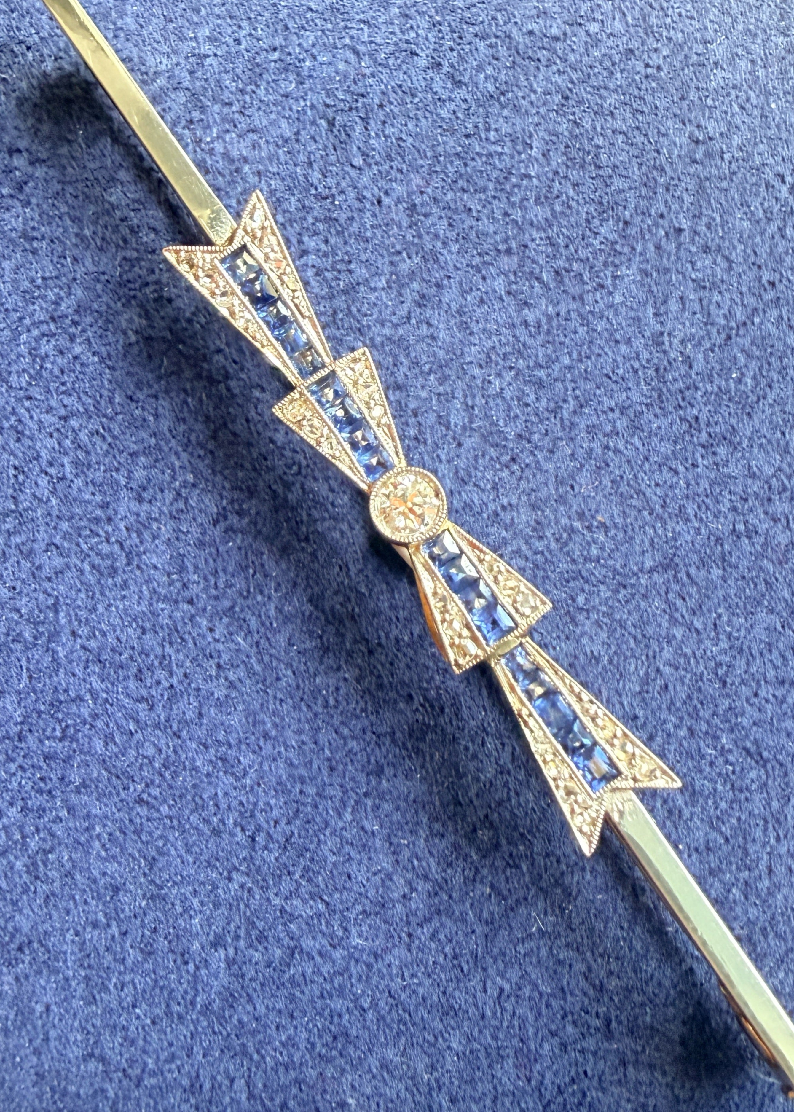 Art Deco 18K gold diamond sapphire bow brooch