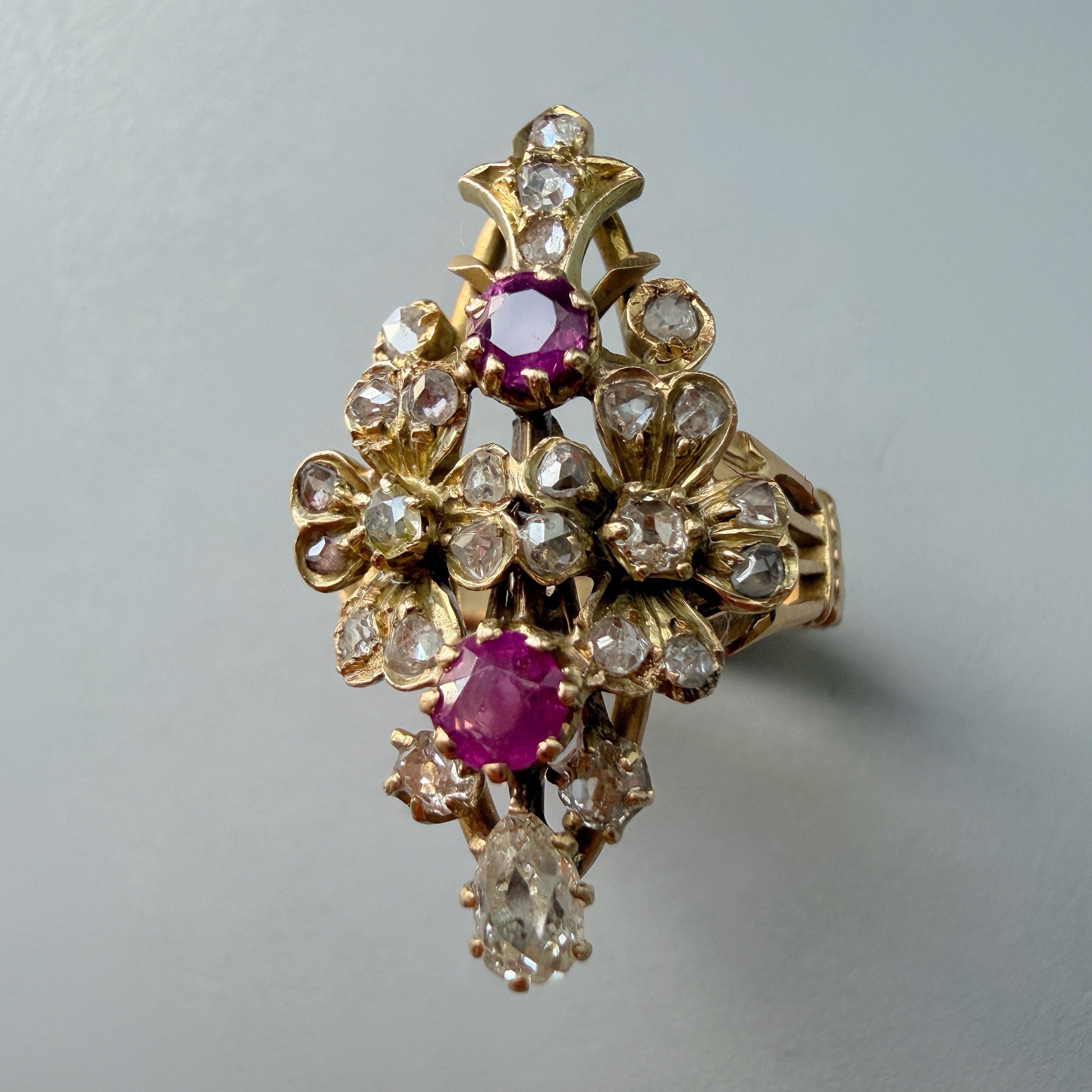Antique 18K yellow gold diamond ruby flower ring