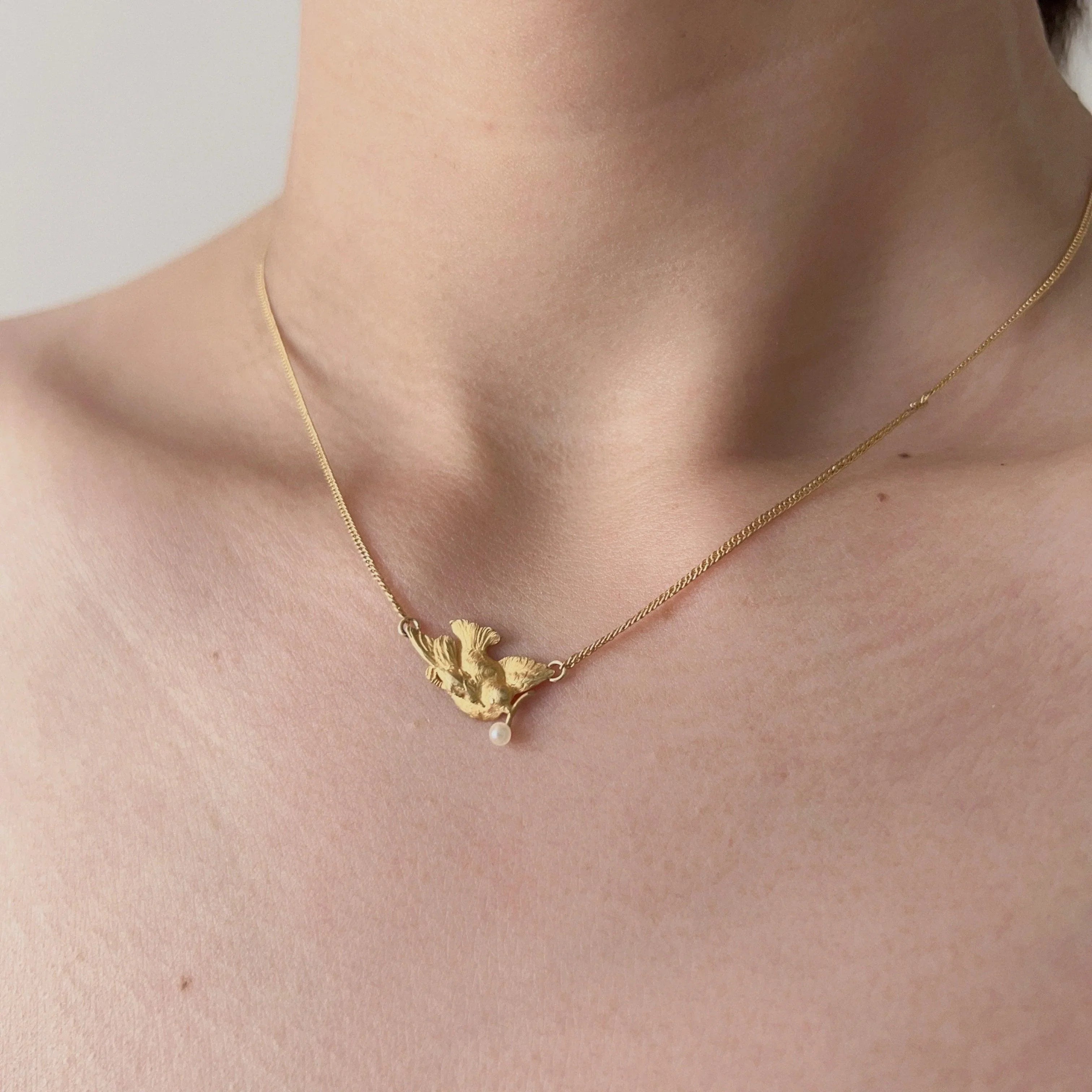 Antique 18K gold swallow necklace with natural pearl - Curiously timeless