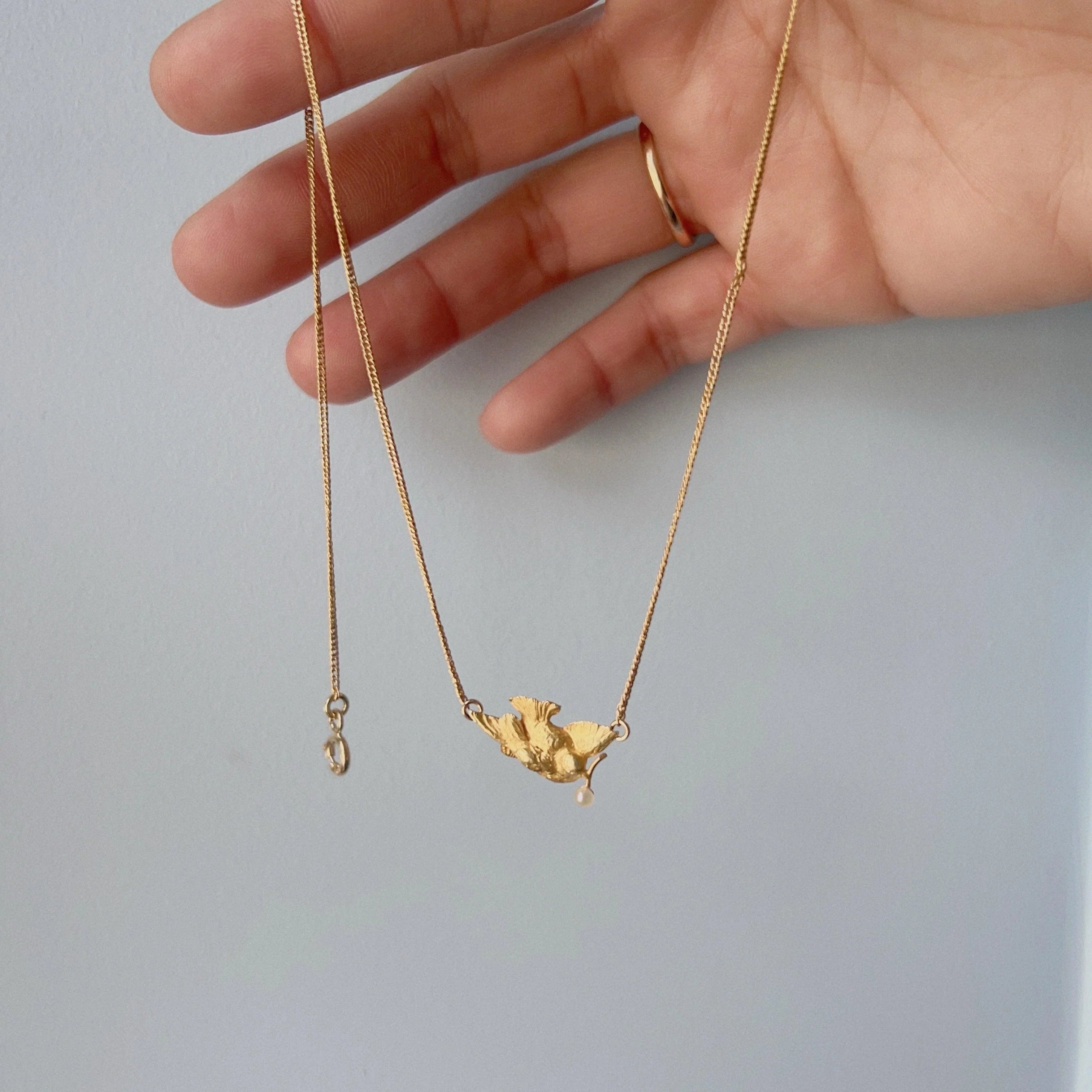 Antique 18K gold swallow necklace with natural pearl - Curiously timeless