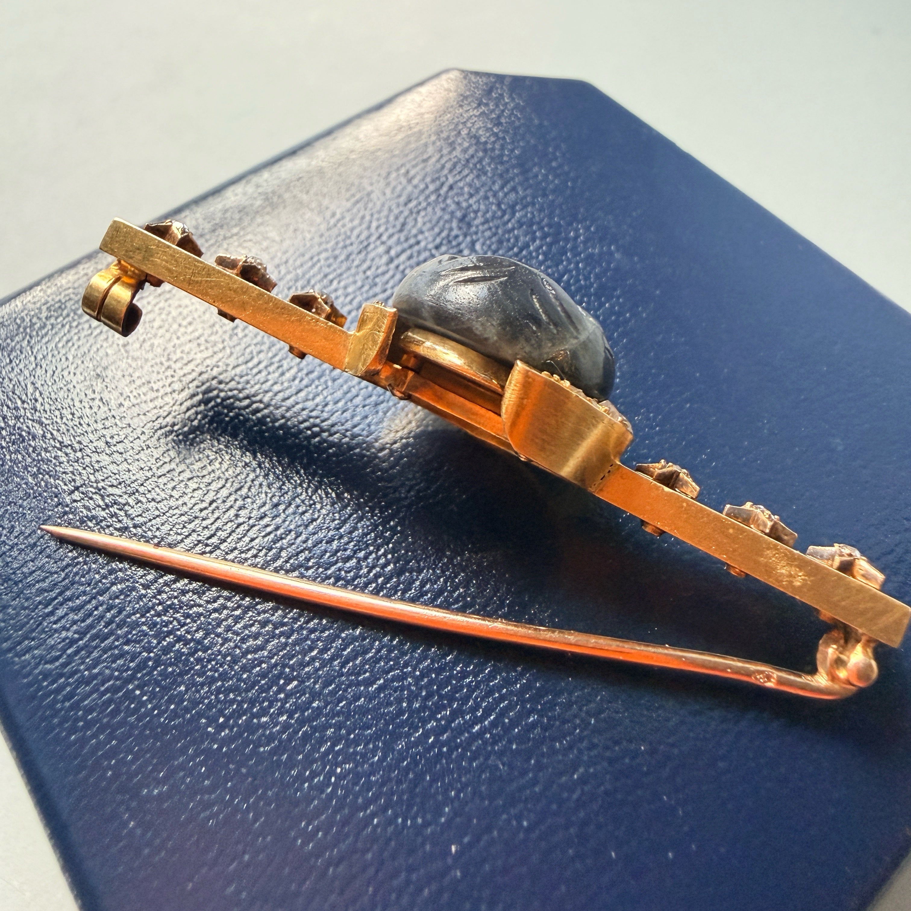 Antique 18K gold carved labradorite moon face brooch with diamond crescent