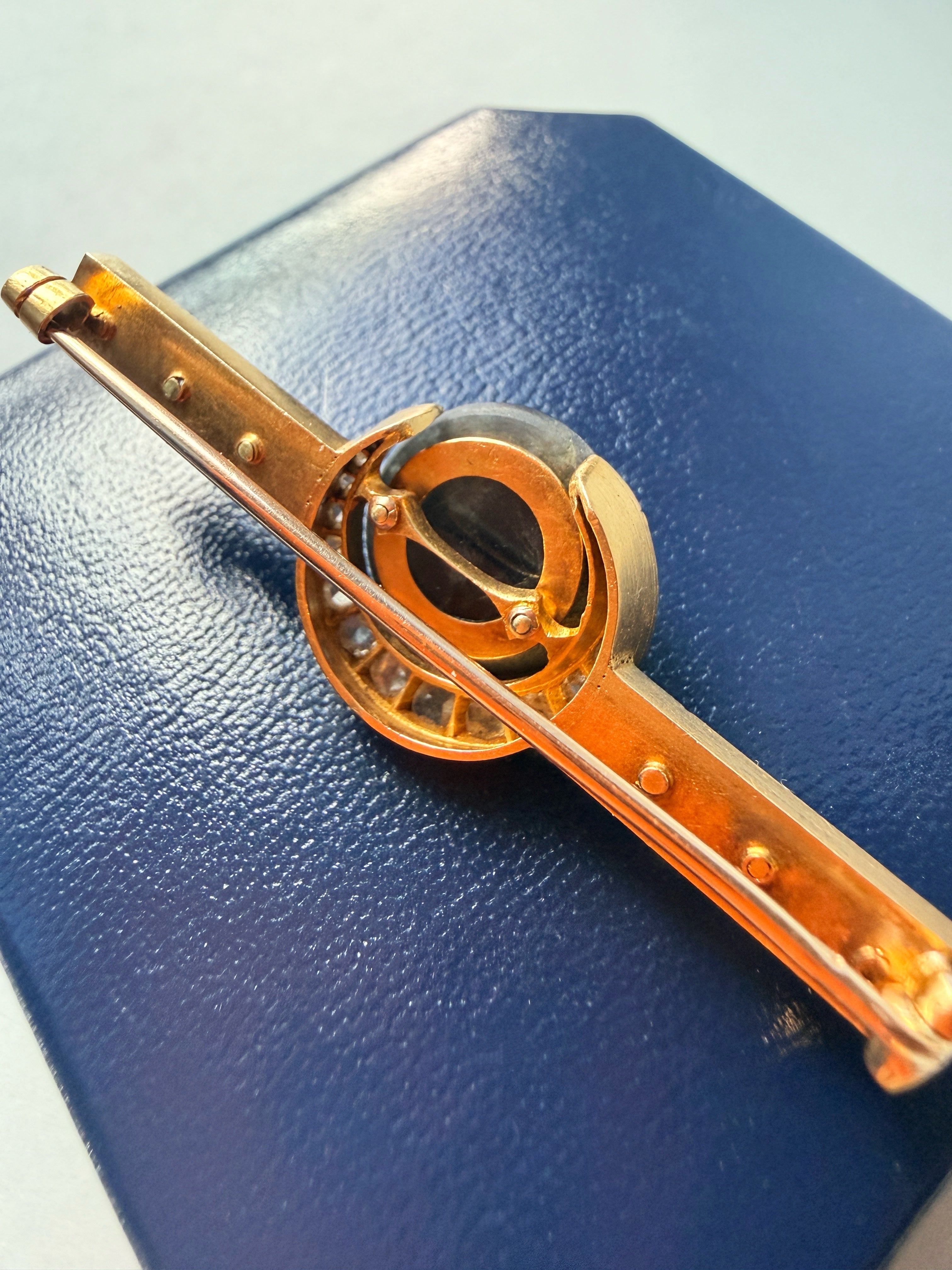 Antique 18K gold carved labradorite moon face brooch with diamond crescent