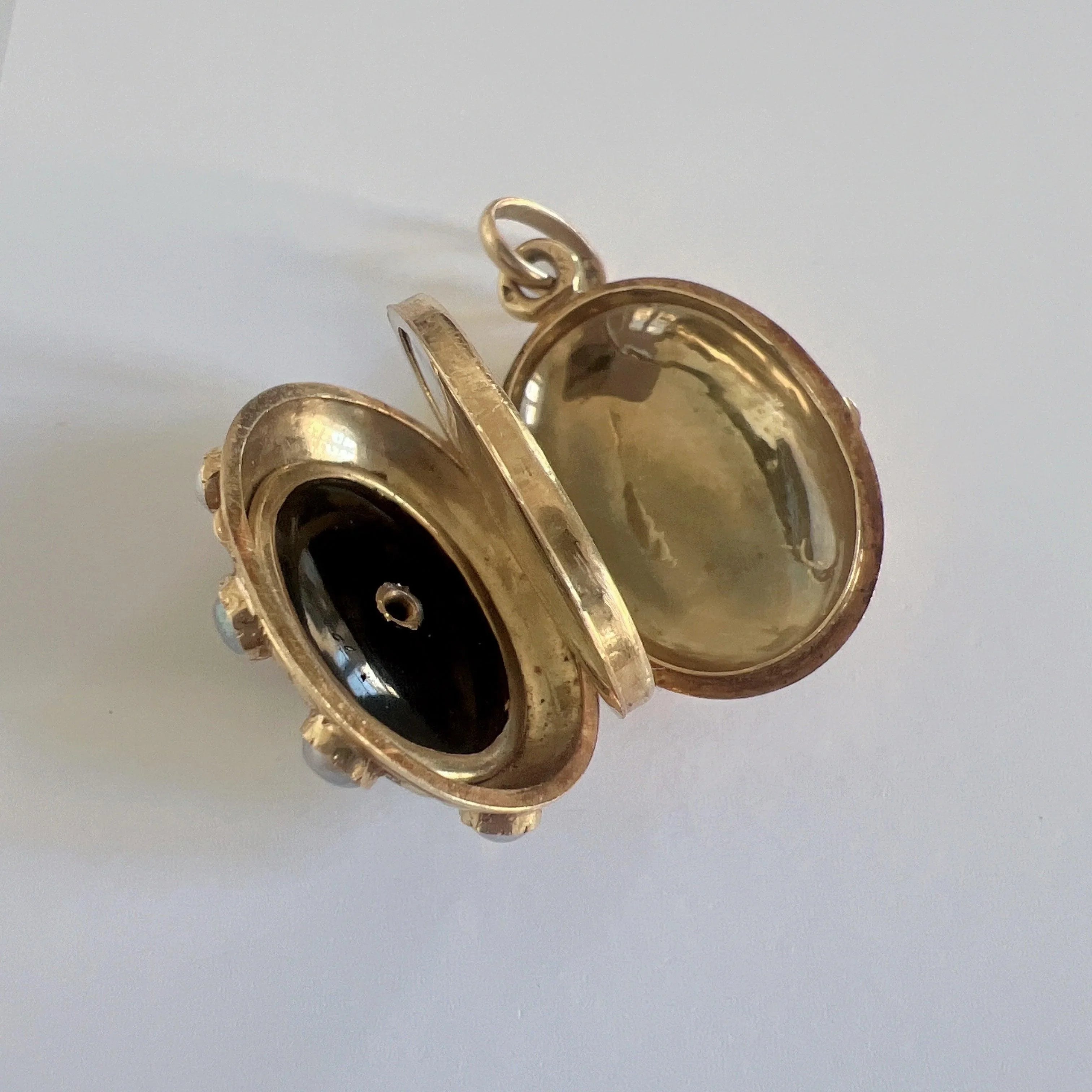 Victorian era 18K gold ruby natural pearl onyx star locket - Curiously timeless