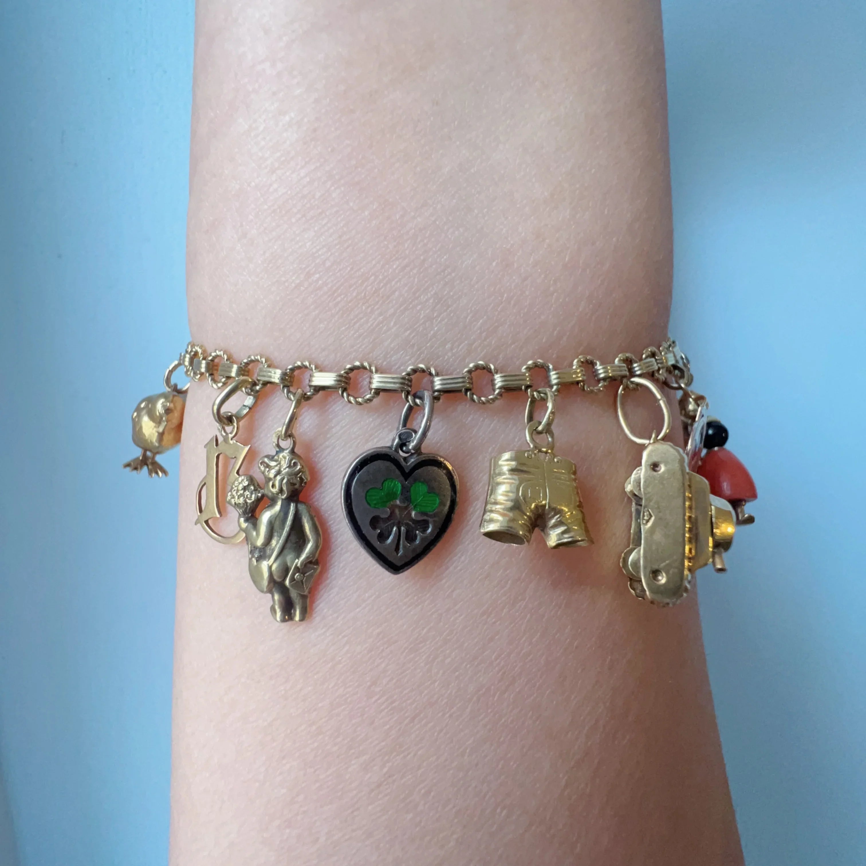 14K yellow Gold charm bracelet
