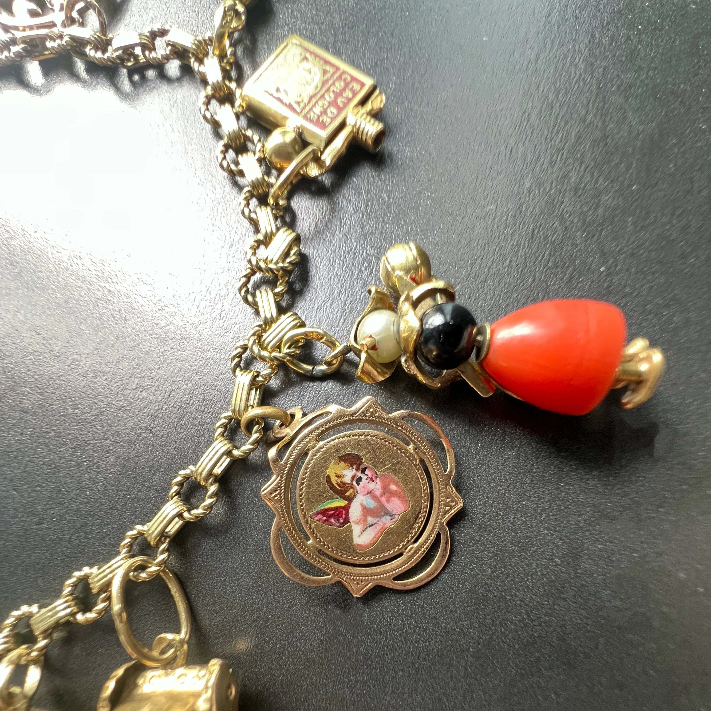 14K yellow Gold charm bracelet