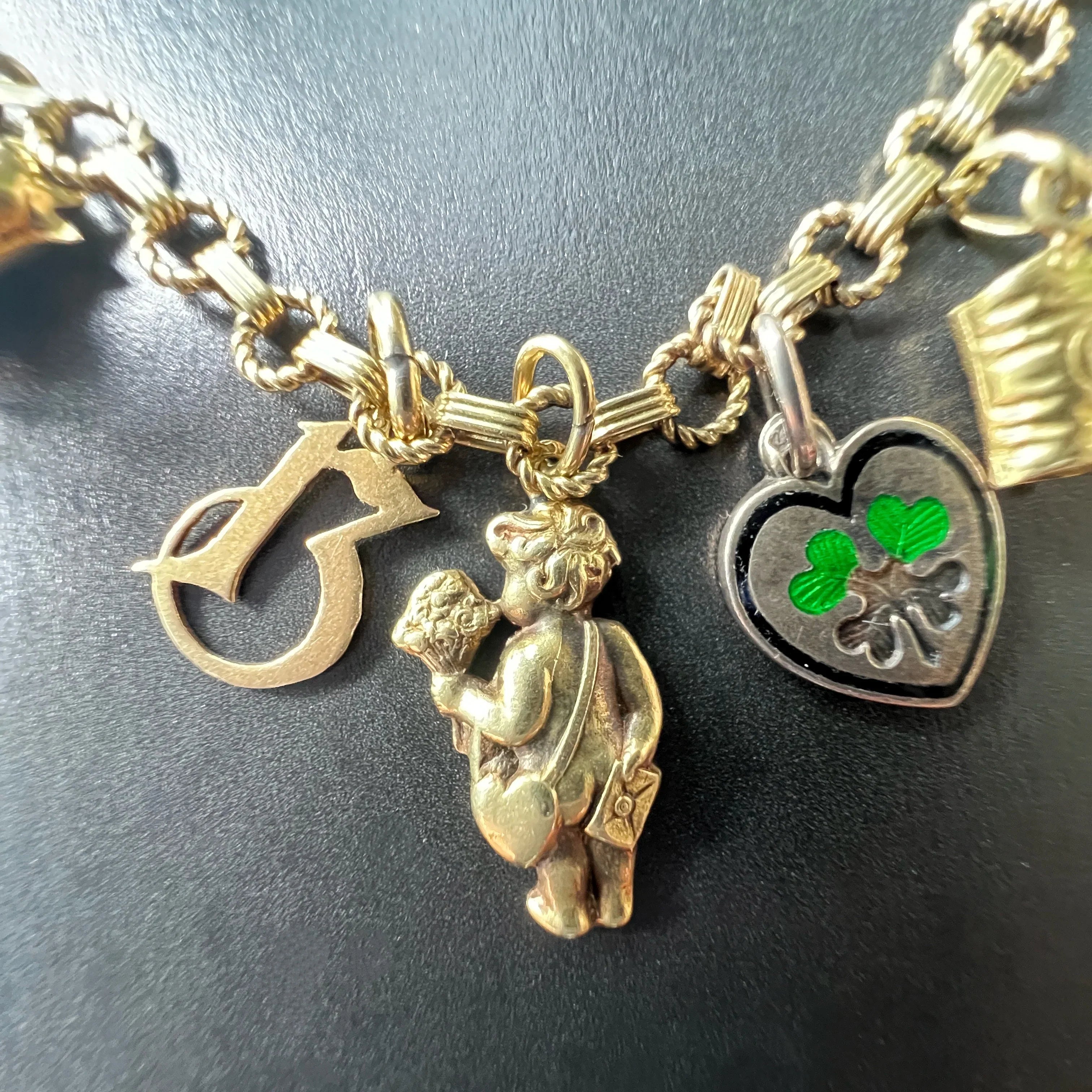 14K yellow Gold charm bracelet