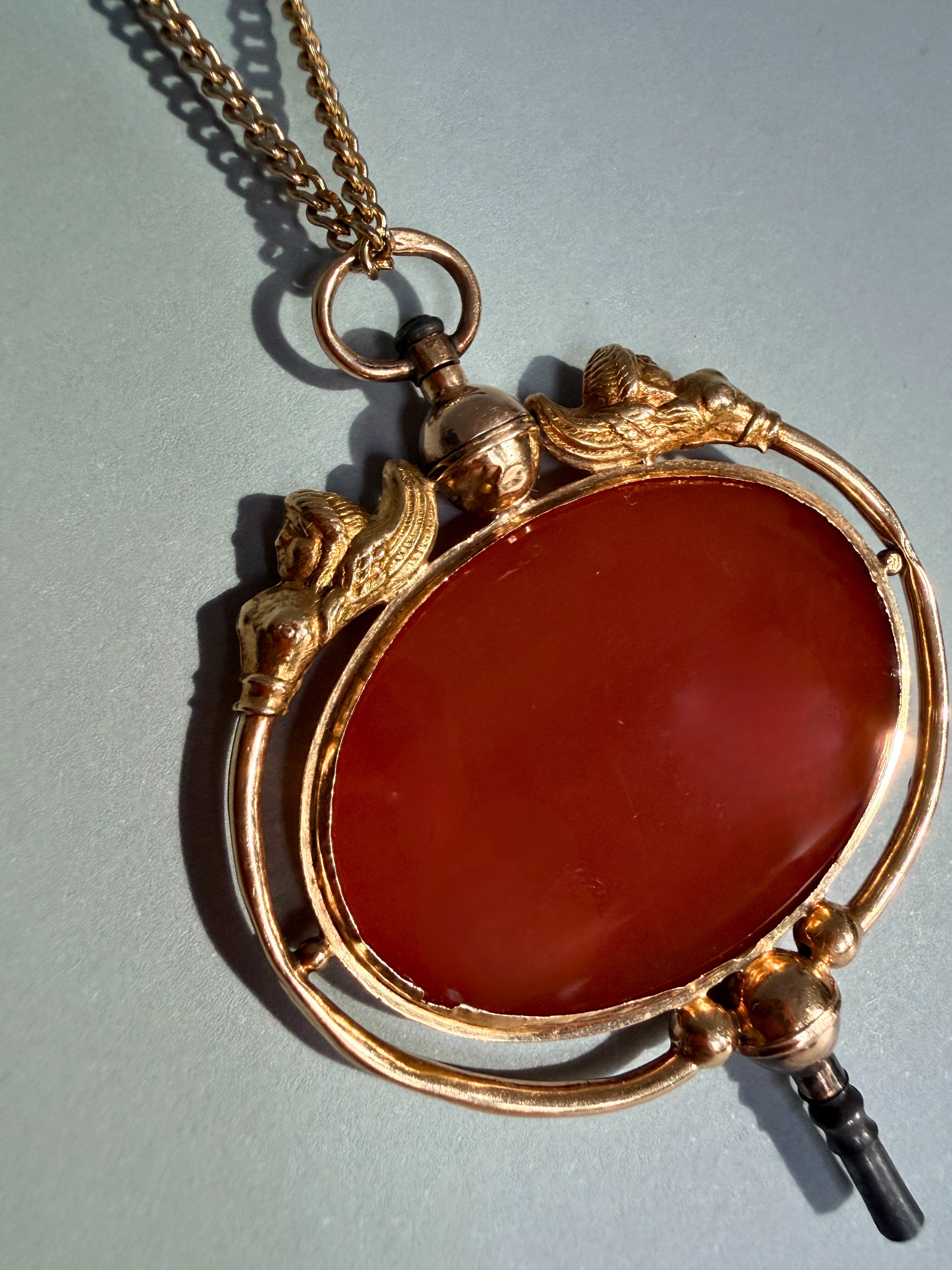 Victorian era 18K gold Egyptomania cornelian watch key pendant