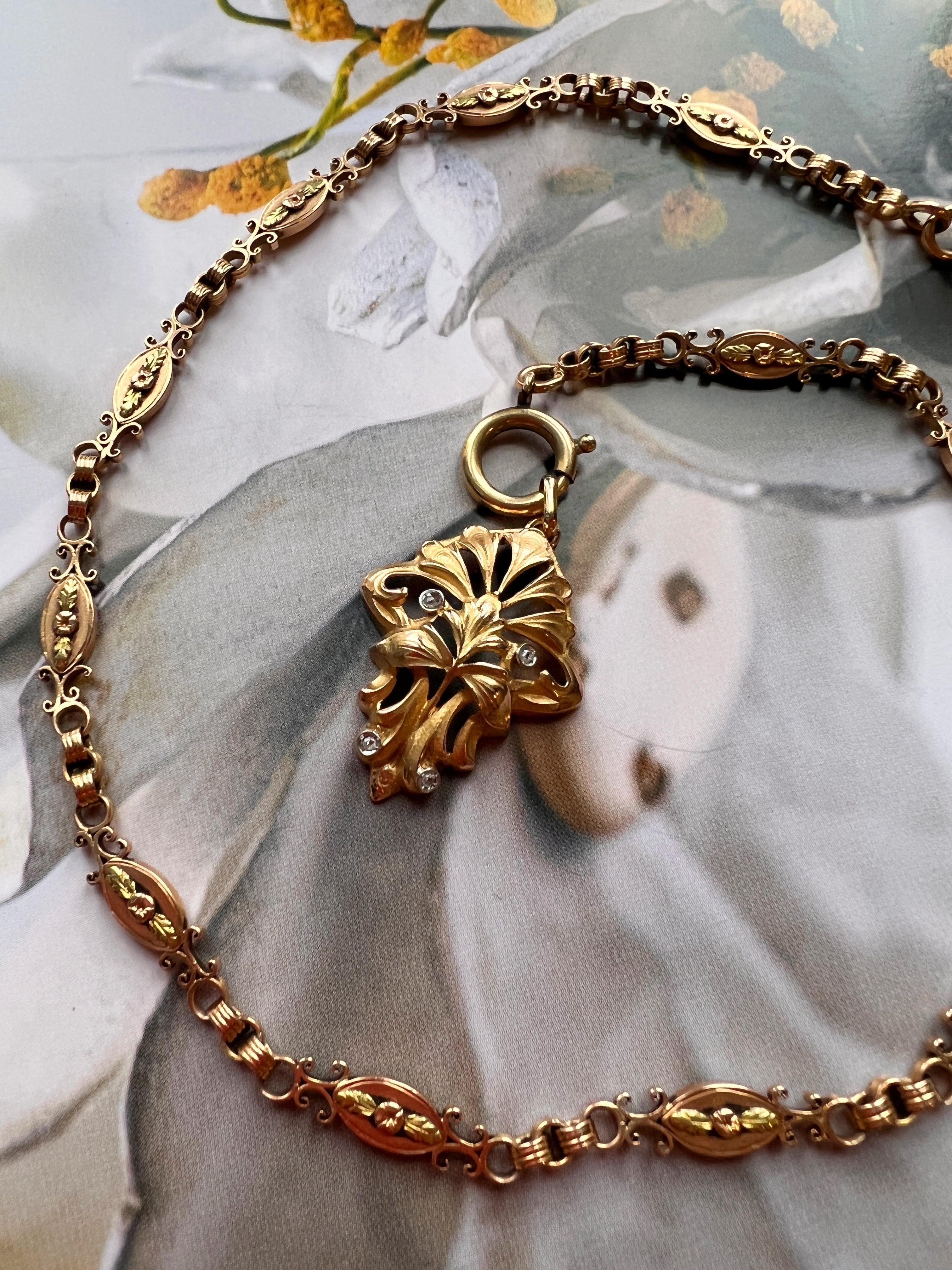 Elegant French Art Nouveau 18K gold Diamond Lily Flower pendant - Curiously timeless