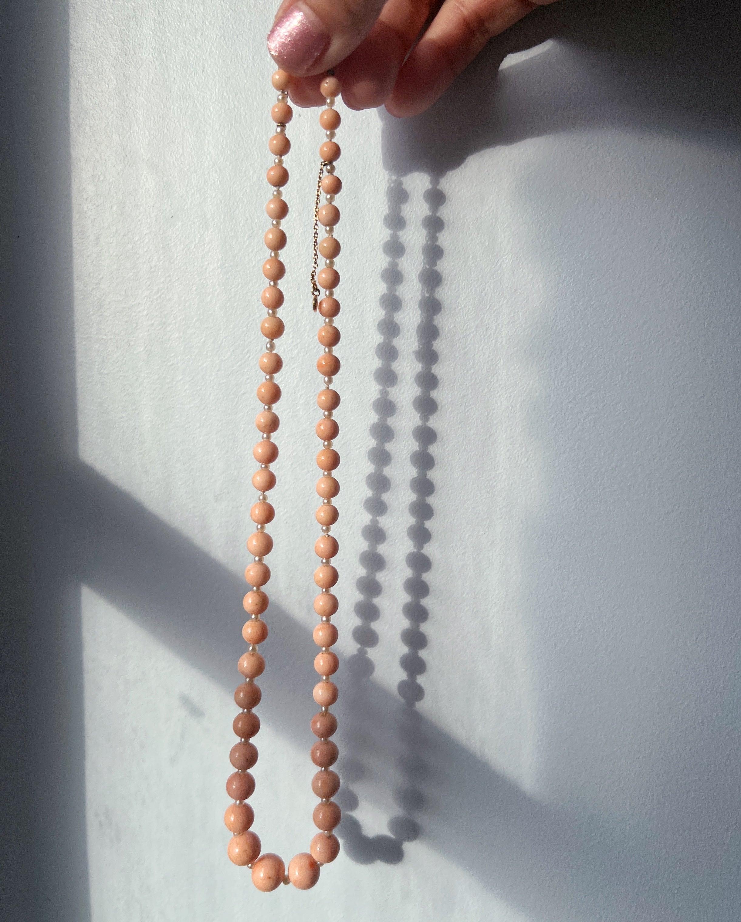 18K gold graduated natural angel skin pink coral pearl necklace - Curiously timeless