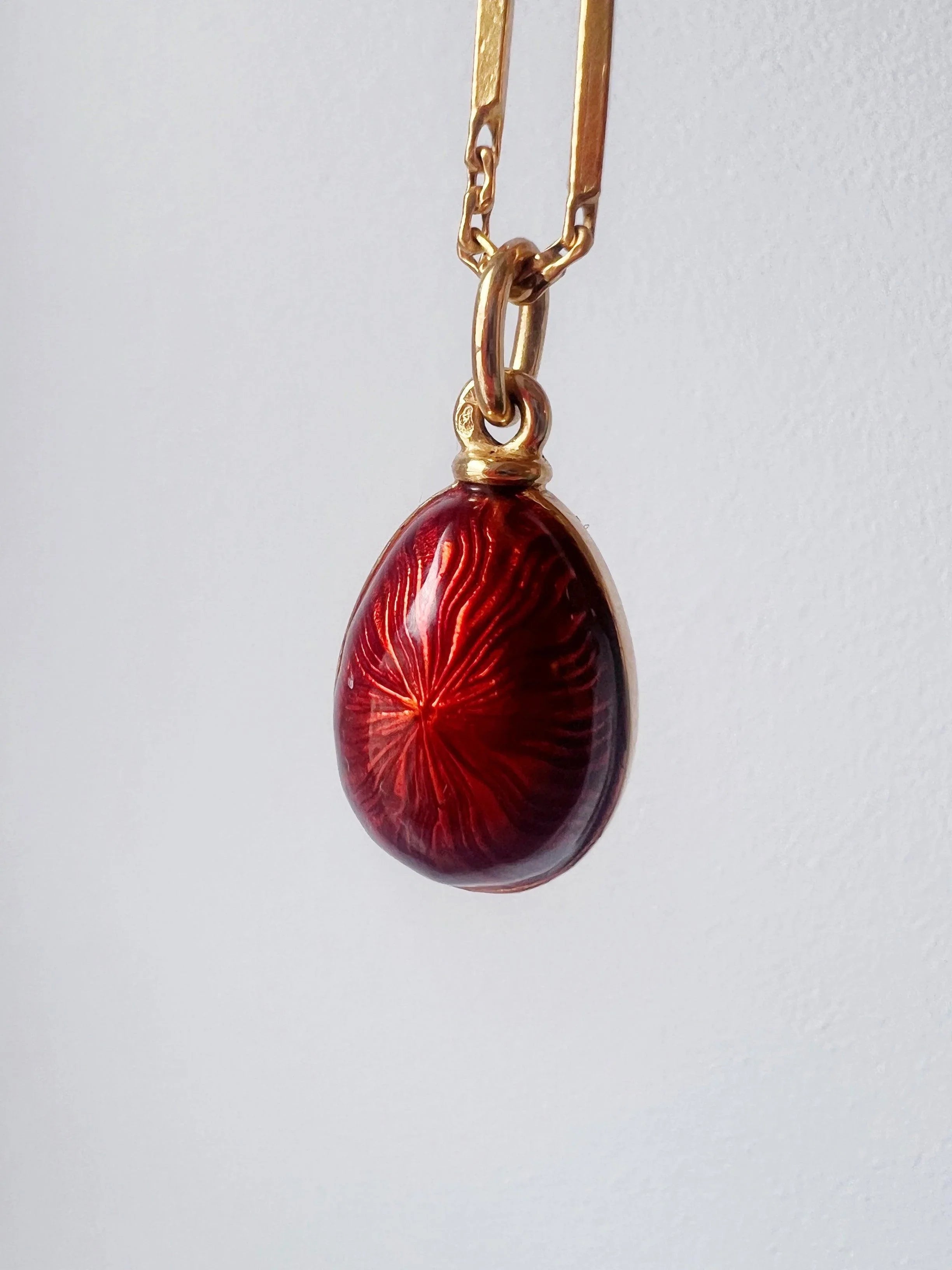 Beautiful Russian style 18K gold red enameled egg pendant - Curiously timeless