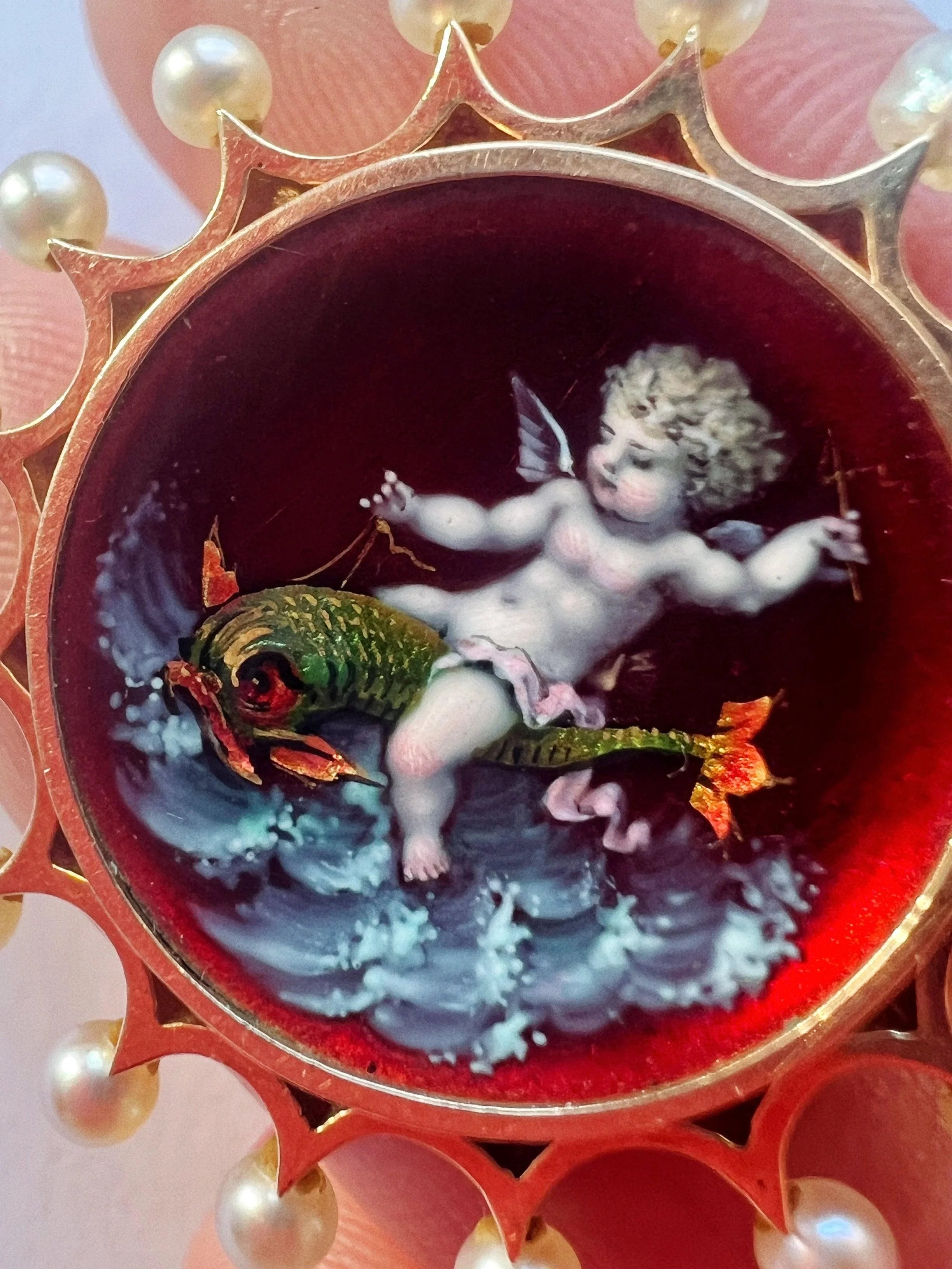 Victorian era 18K gold pearl enamel cupid riding a dolphin brooch - Curiously timeless