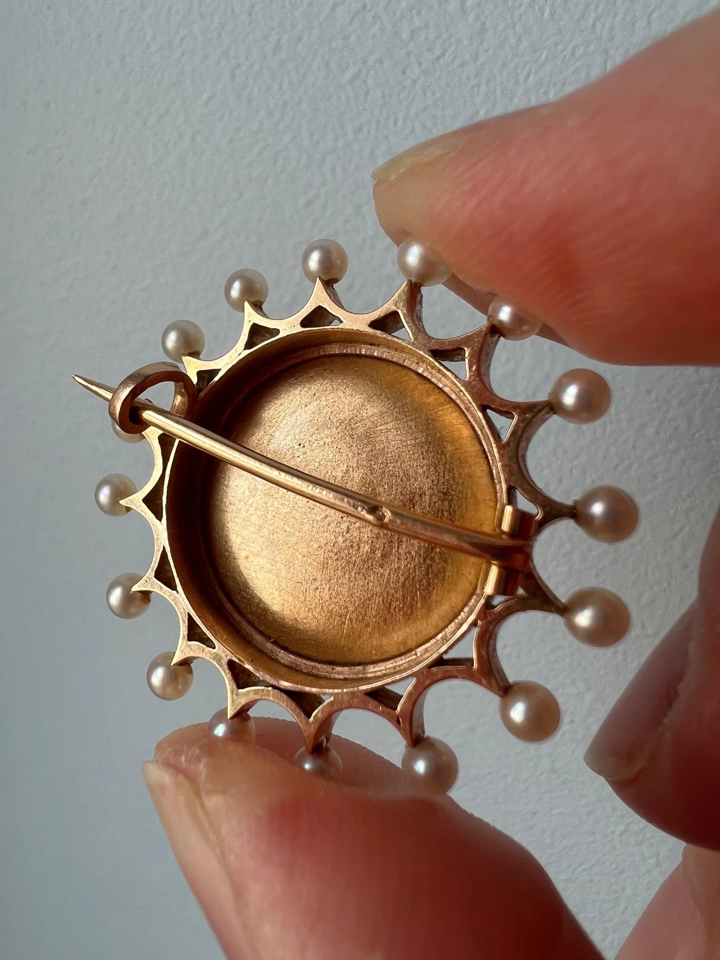 Victorian era 18K gold pearl enamel cupid riding a dolphin brooch - Curiously timeless