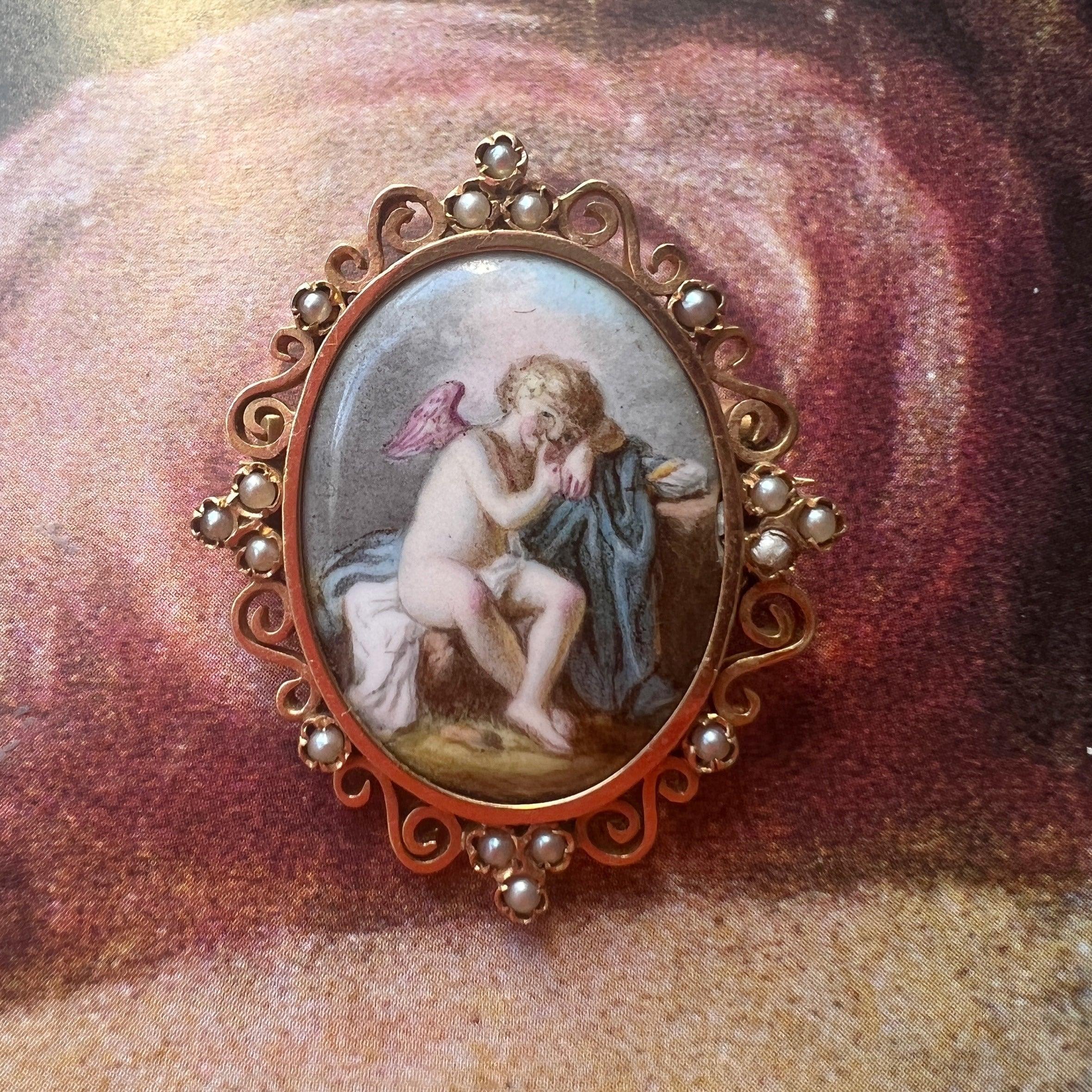 Antique 18K gold angel brooch with seed pearls - Curiously timeless