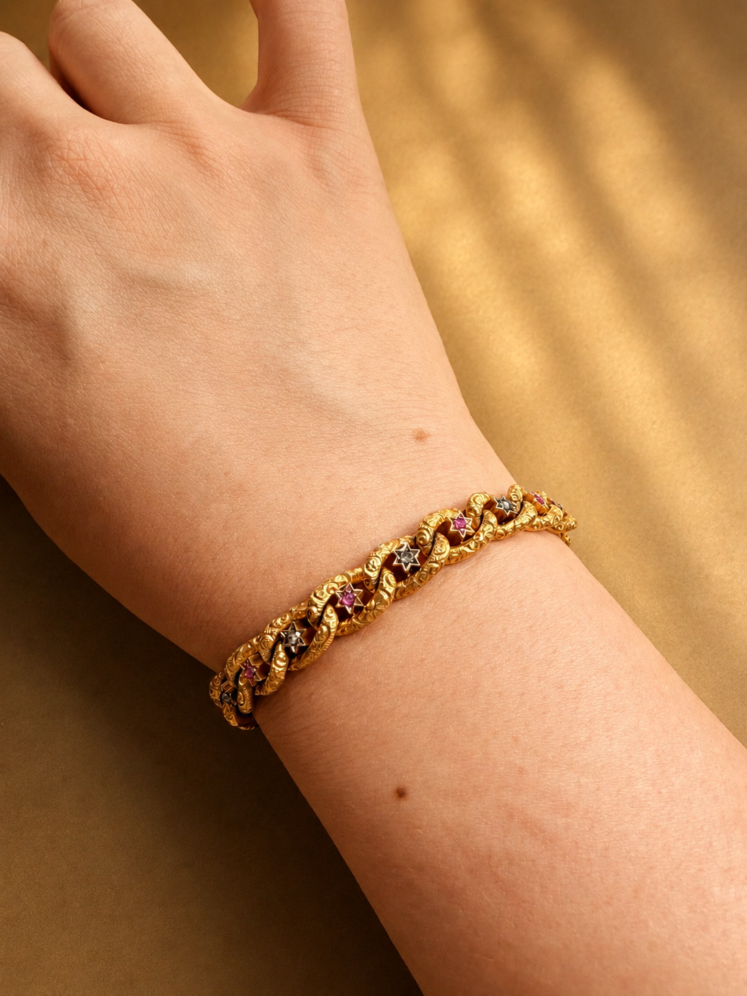 Antique 18K yellow gold star curb link bracelet