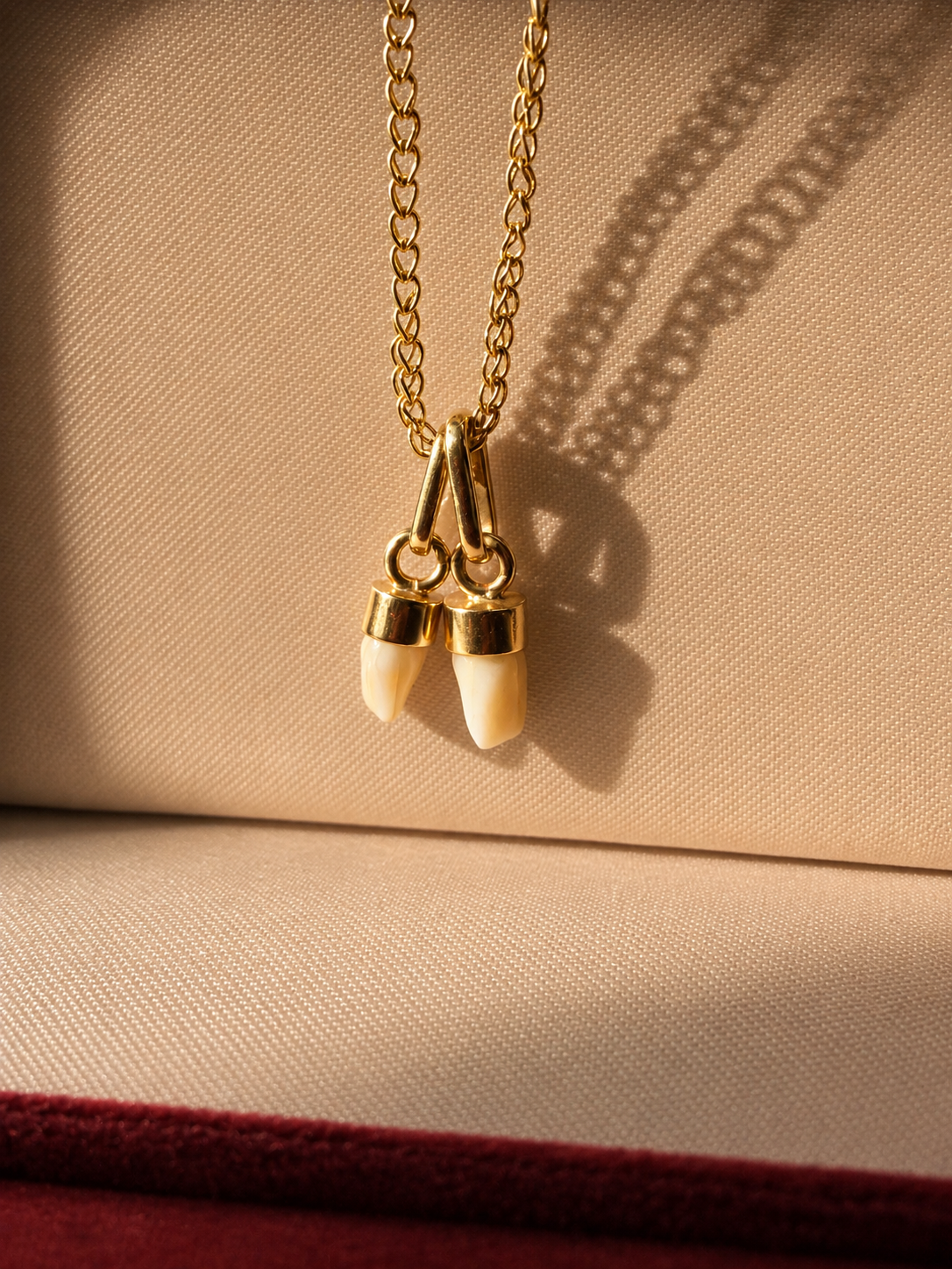 Pair of 2 Antique 18K gold milk teeth pendant
