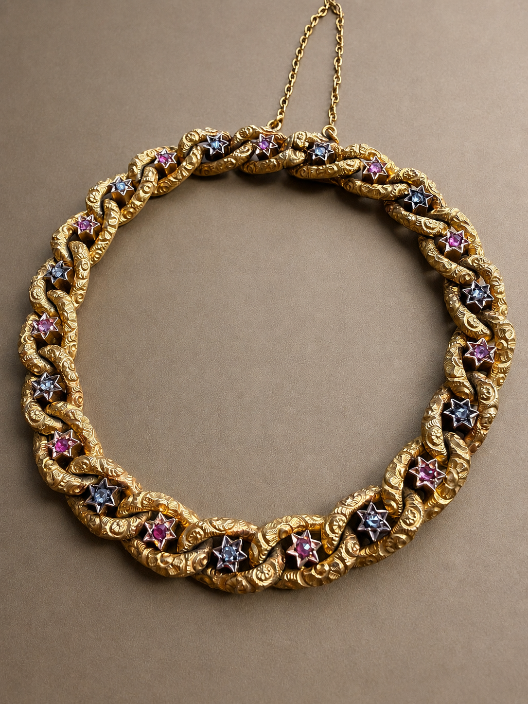 Antique 18K yellow gold star curb link bracelet