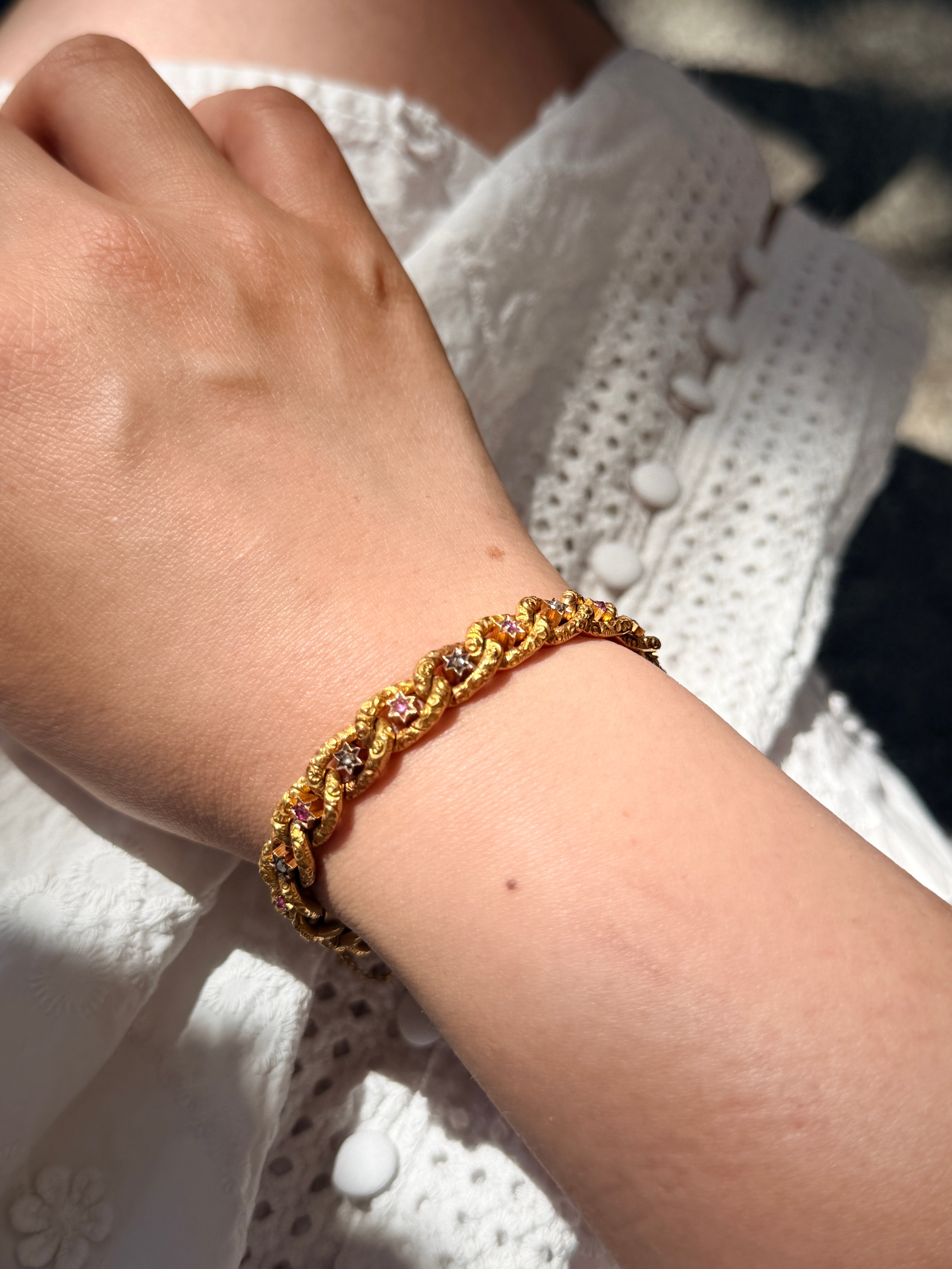 Antique 18K yellow gold star curb link bracelet