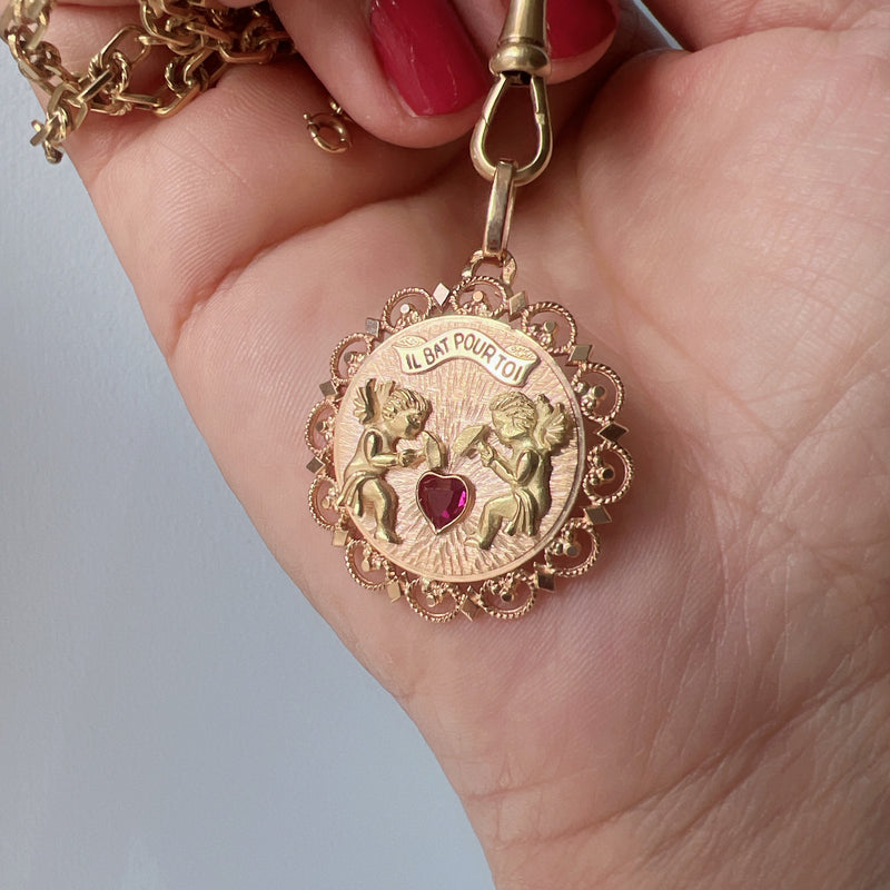 French 18K gold “my heart beats for you” articulated medal pendant