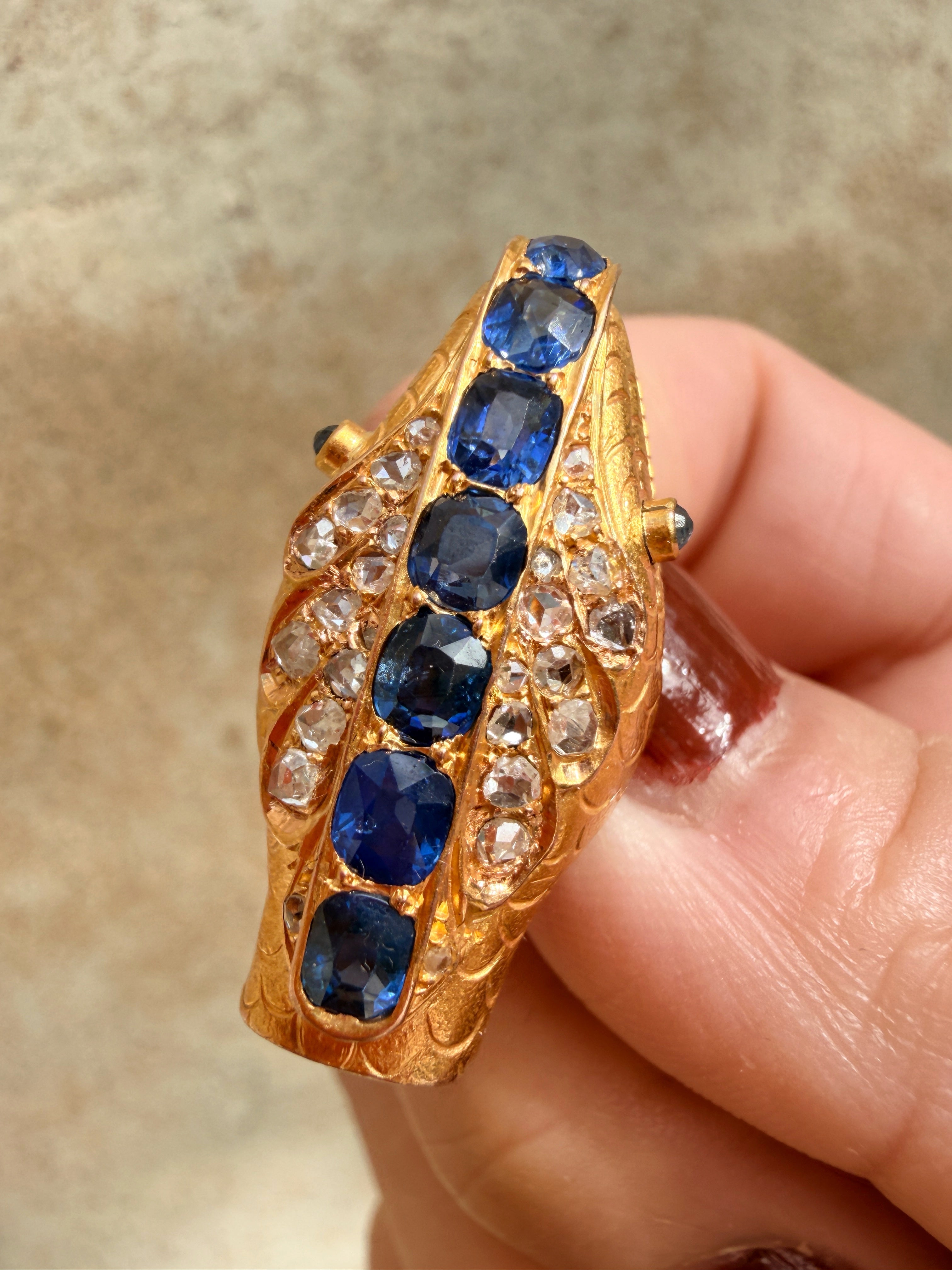 Antique 18K gold blue sapphire diamond snake head brooch