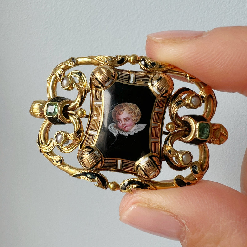 Antique 18K gold cherub brooch with emeralds and natural pearls