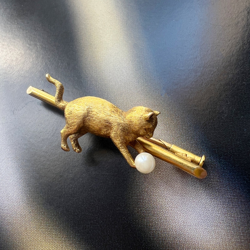 Antique 18K gold cat chasing a pearl ball brooch