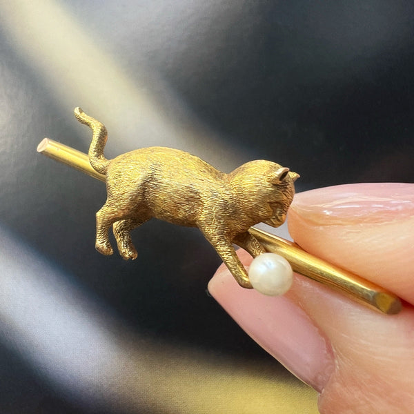 Antique 18K gold cat chasing a pearl ball brooch