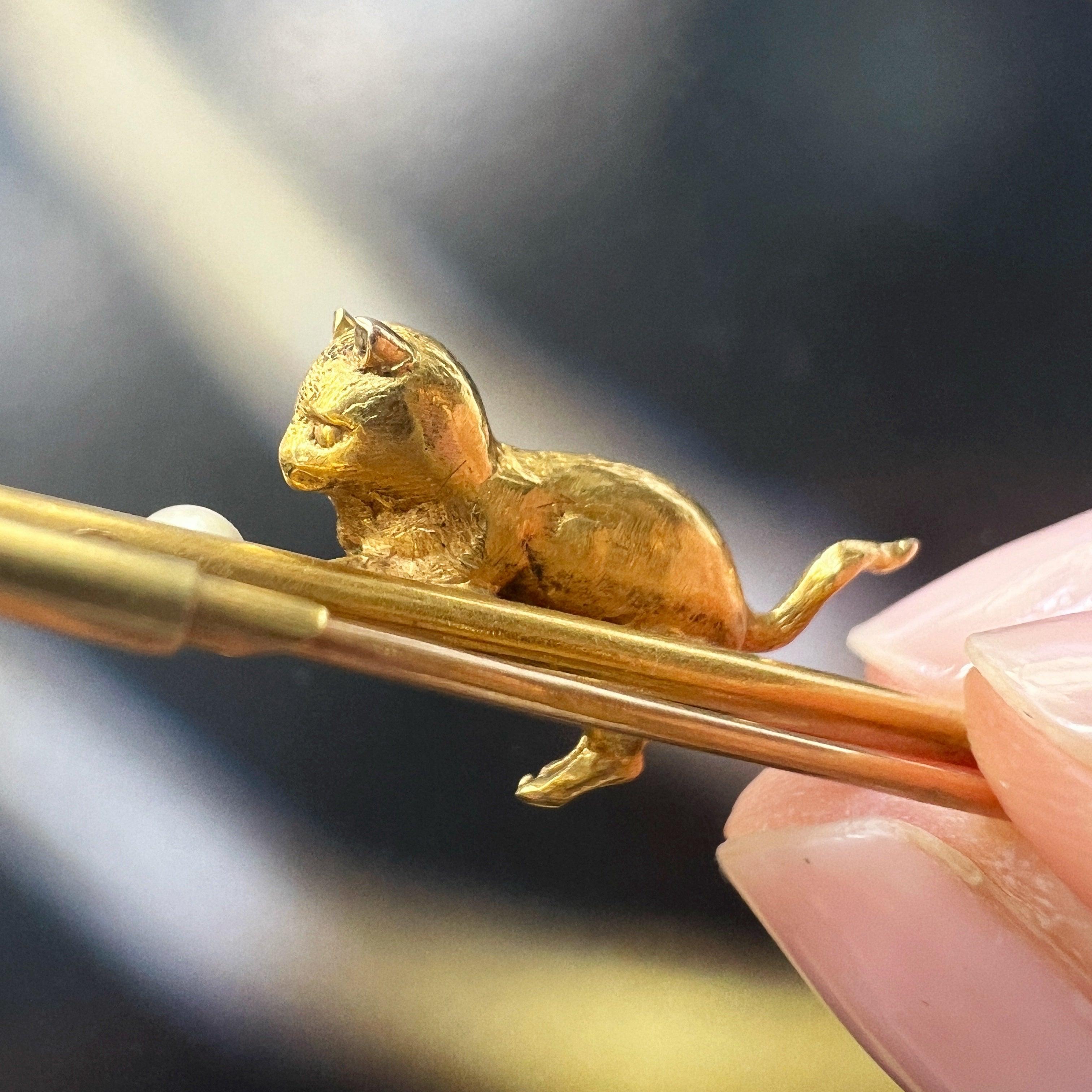 Antique 18K gold cat chasing a pearl ball brooch - Curiously timeless