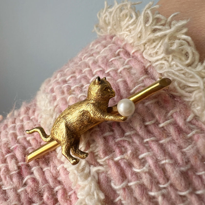 Antique 18K gold cat chasing a pearl ball brooch